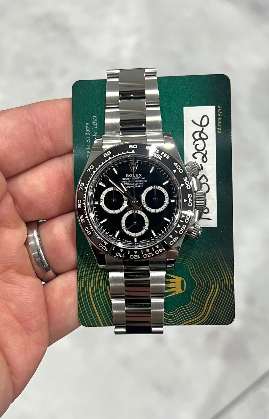 May be an image of digital watch and text