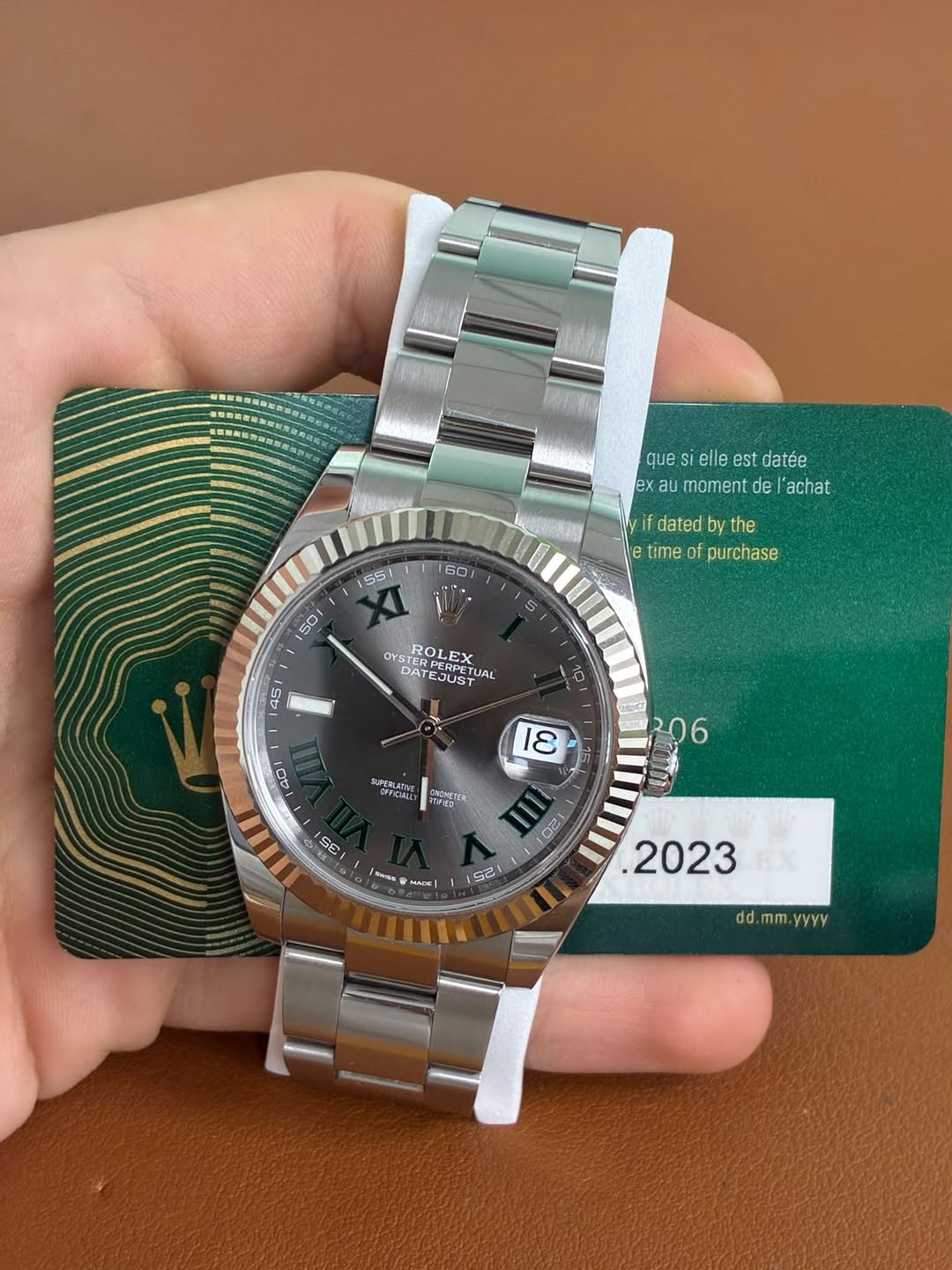 May be an image of wrist watch and text that says 'que quesielleestdatée si elle est datée ex exaumomentdel'achat au moment de 'achat dated byt the e time purchase OYST OYSTERE…