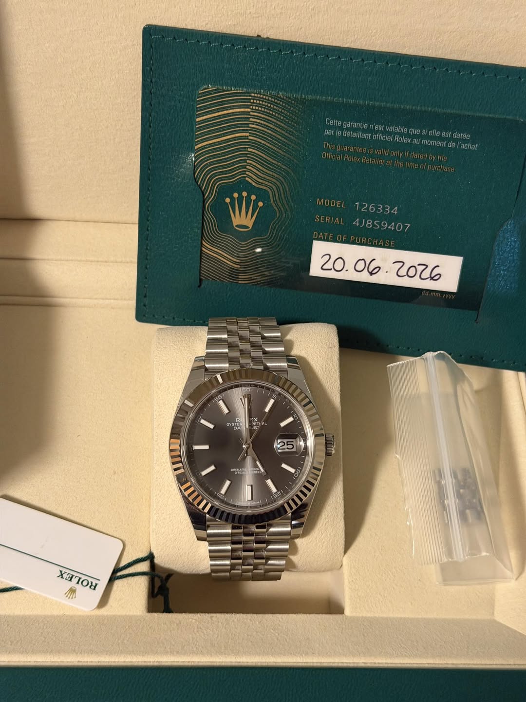 May be an image of wrist watch and text