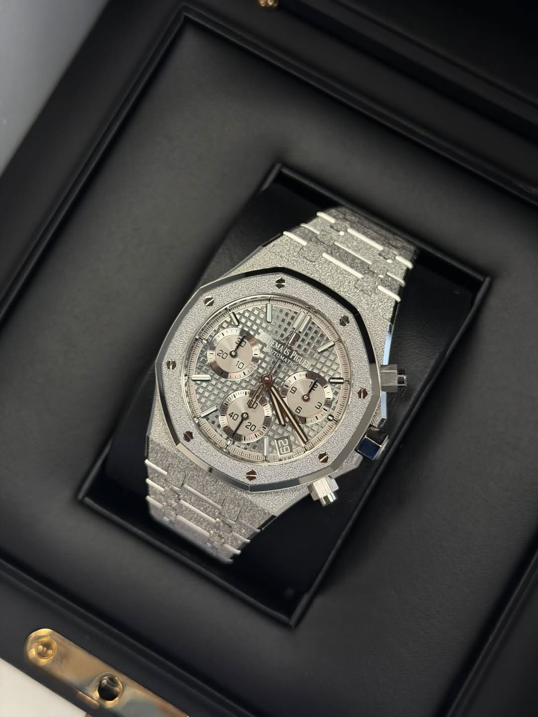 May be an image of wrist watch and text