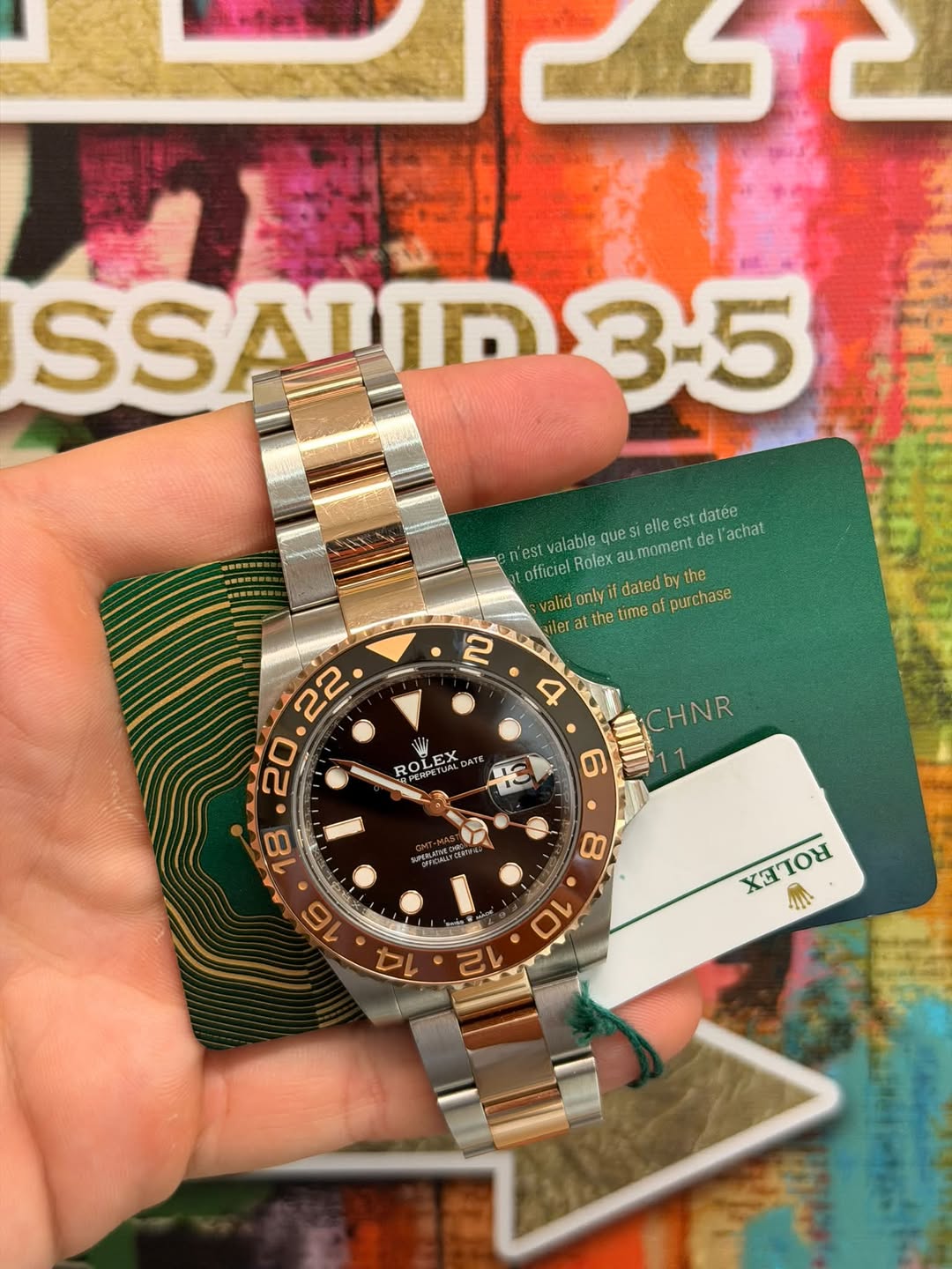 May be an image of wrist watch and text