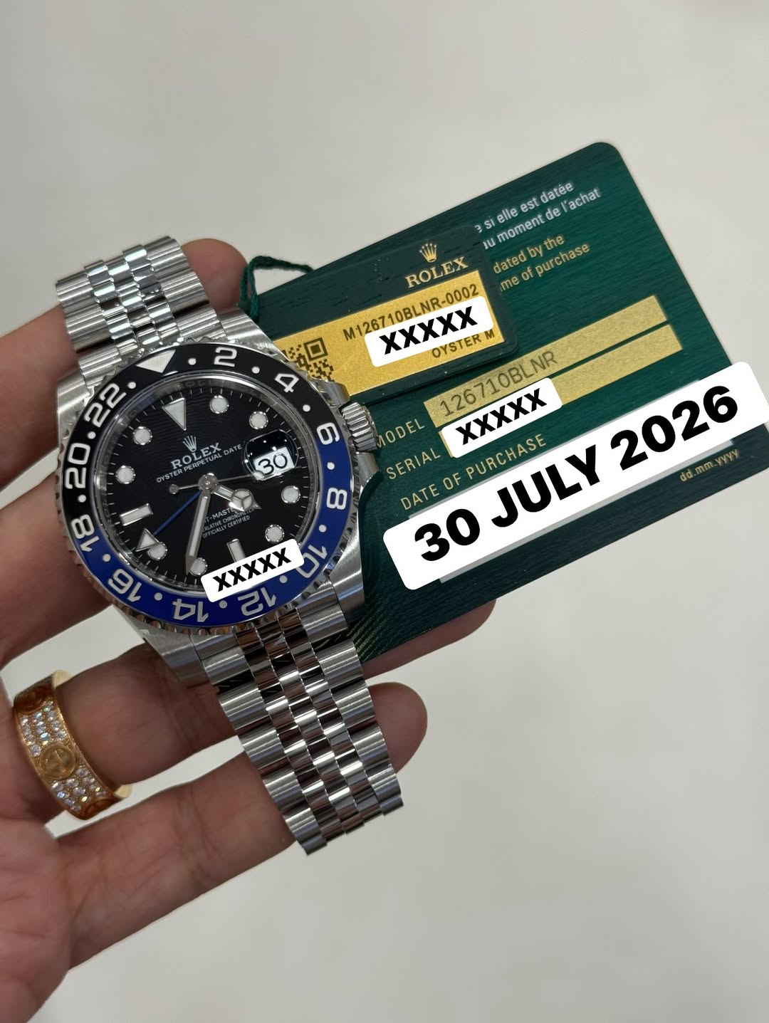 May be an image of wrist watch and text that says '2 3S elle st datén datée achat umomentd αwe purchase ROLEX dated p me 0 M1267 M126710BLNR-0002 XXXXX OYSTER M 126710BLNR XXXXX…