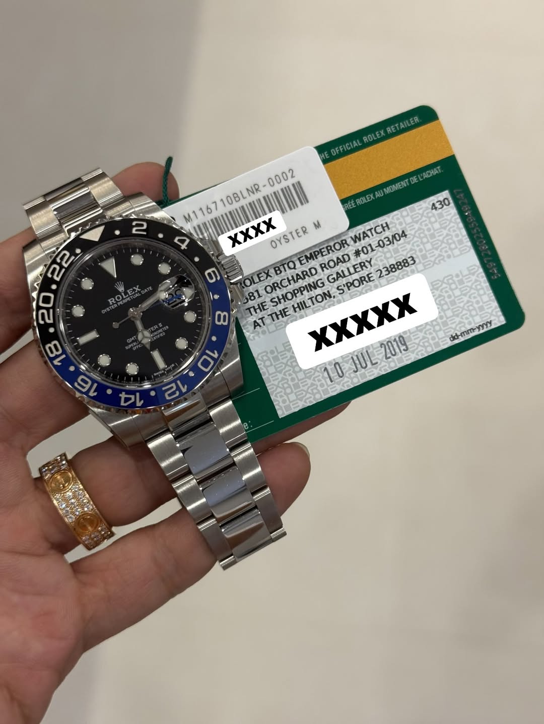 May be an image of wrist watch and text that says '2 430 OFFICIAL ROLEX OFFICIALROLEXRETAILER. ROLEXRETAILER RETAILER M116710BLNR-0002 OBLNR 0002 M1167 ROLEX AU MOMENT DE ACHAT…