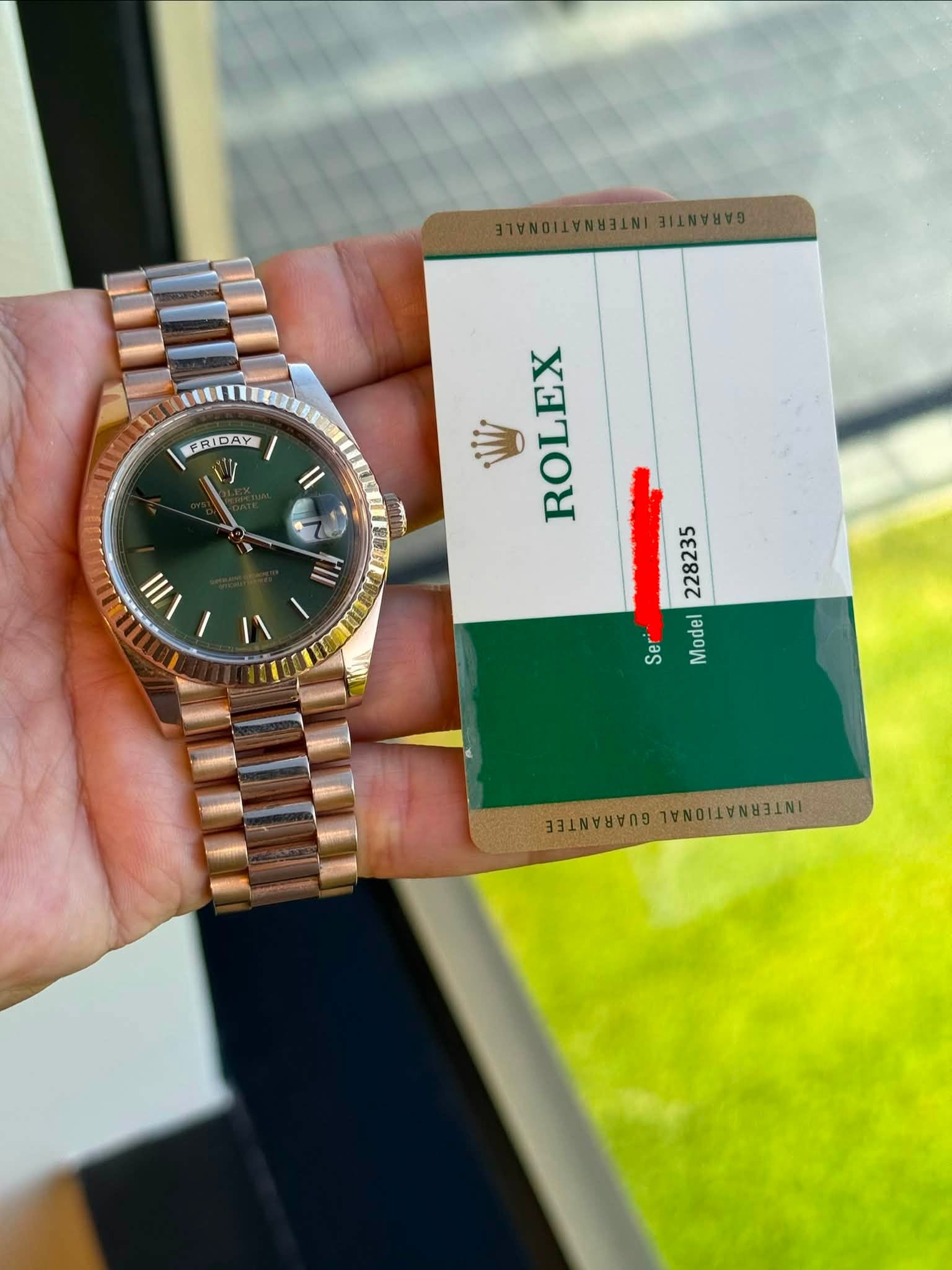 May be an image of wrist watch and text