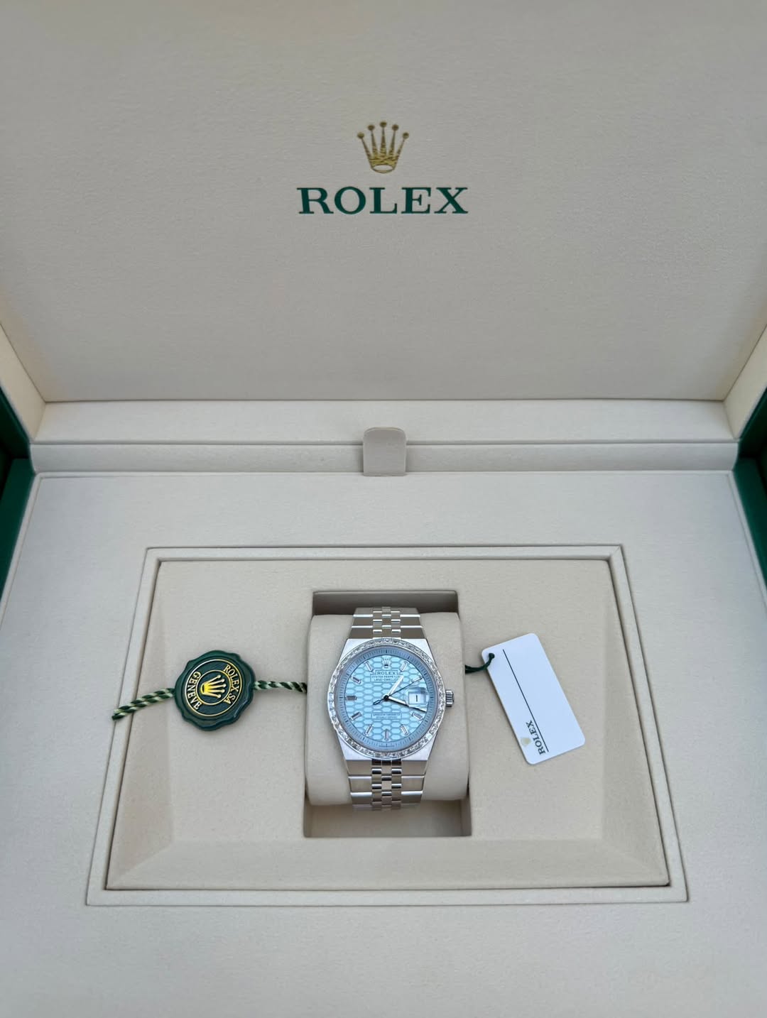May be an image of wrist watch and text