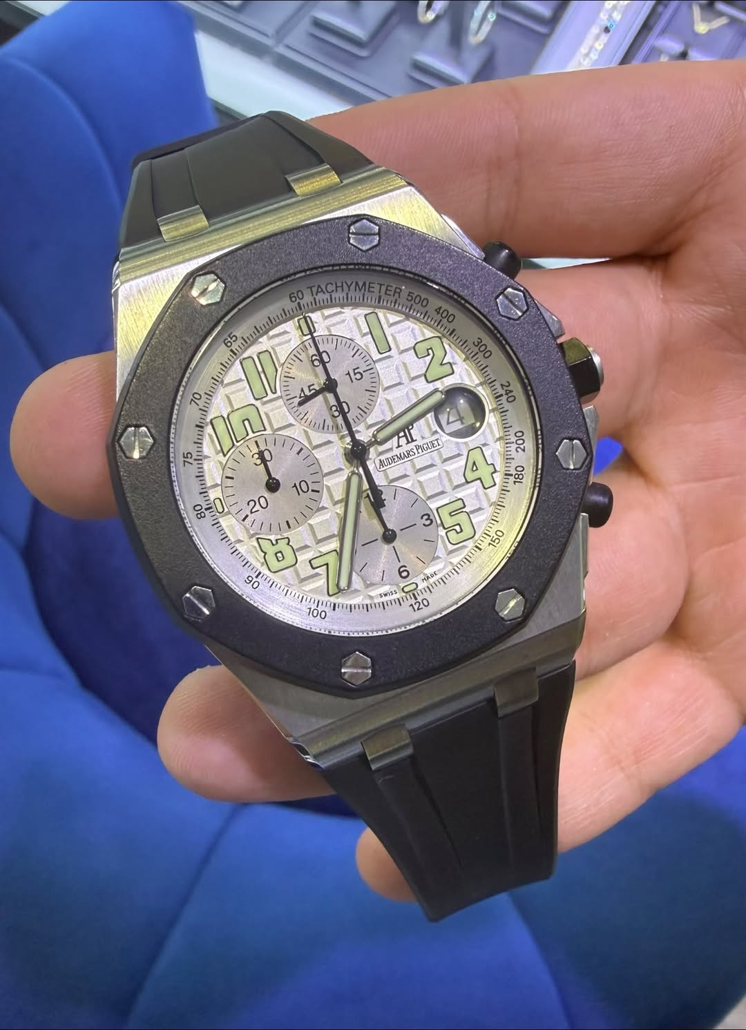 May be an image of wrist watch and text