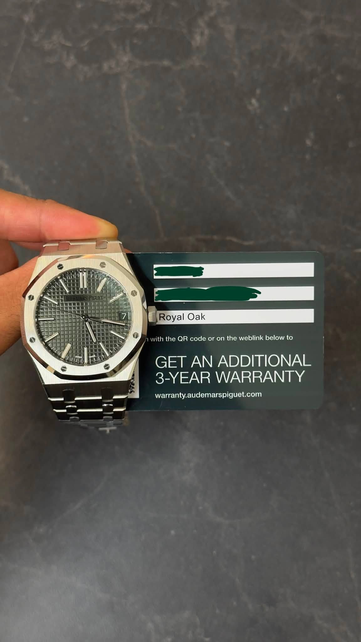 May be an image of wrist watch and text that says 'RoyalOak Royal Oak the QR code oro or the weblink below to GET AN ADDITIONAL 3-YEAR WARRANTY warranty, audemarspiguet.com'