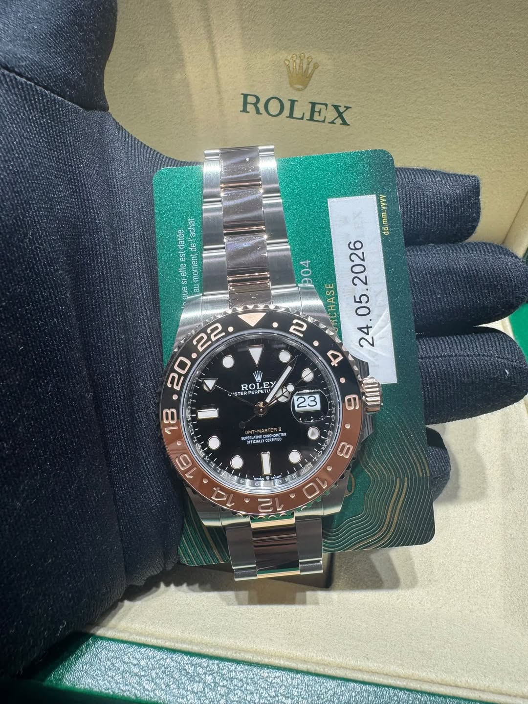 May be an image of wrist watch and text