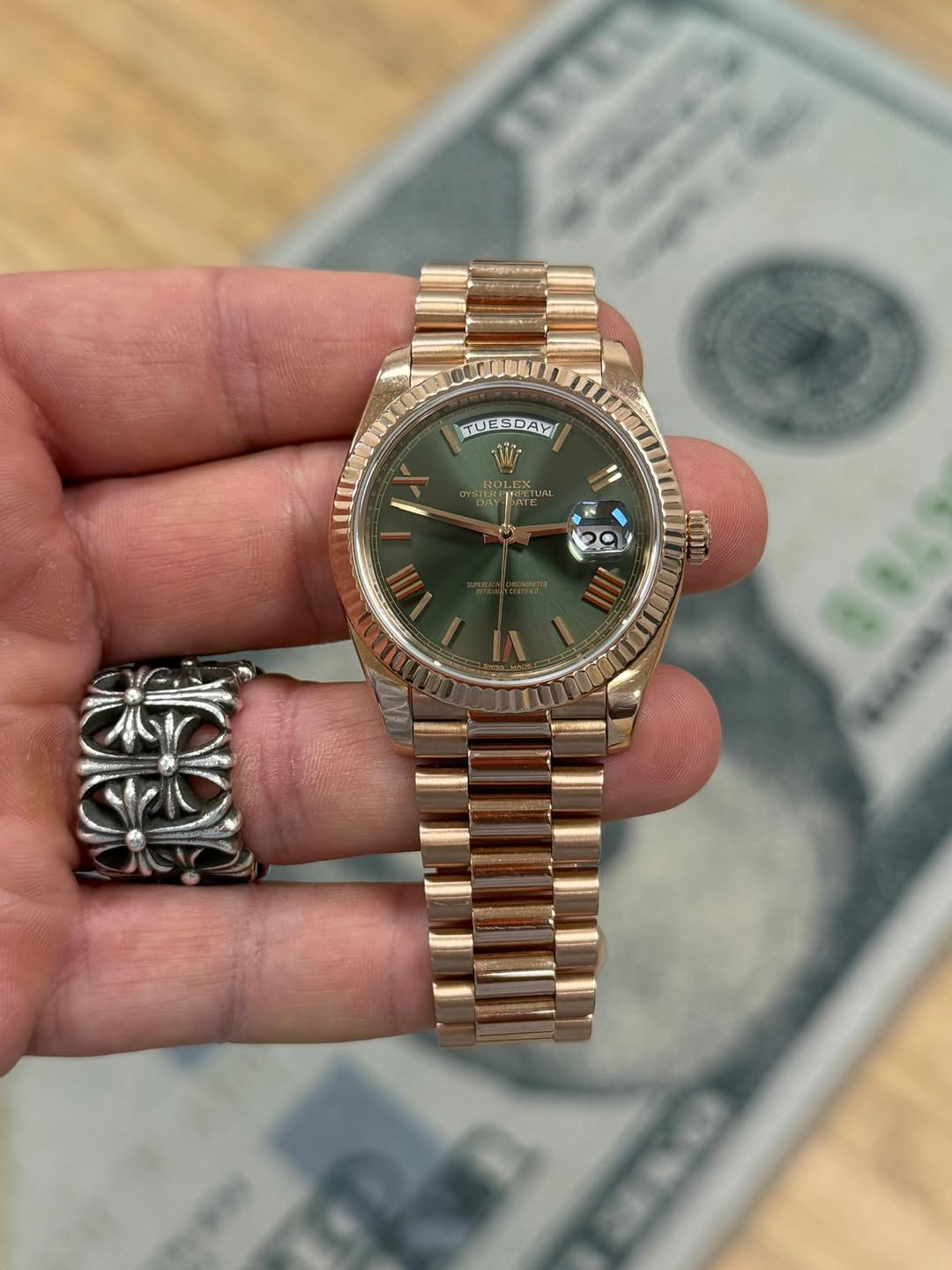 May be an image of wrist watch and text that says 'TUESDAY/ Wi ROLEX JAL 29'