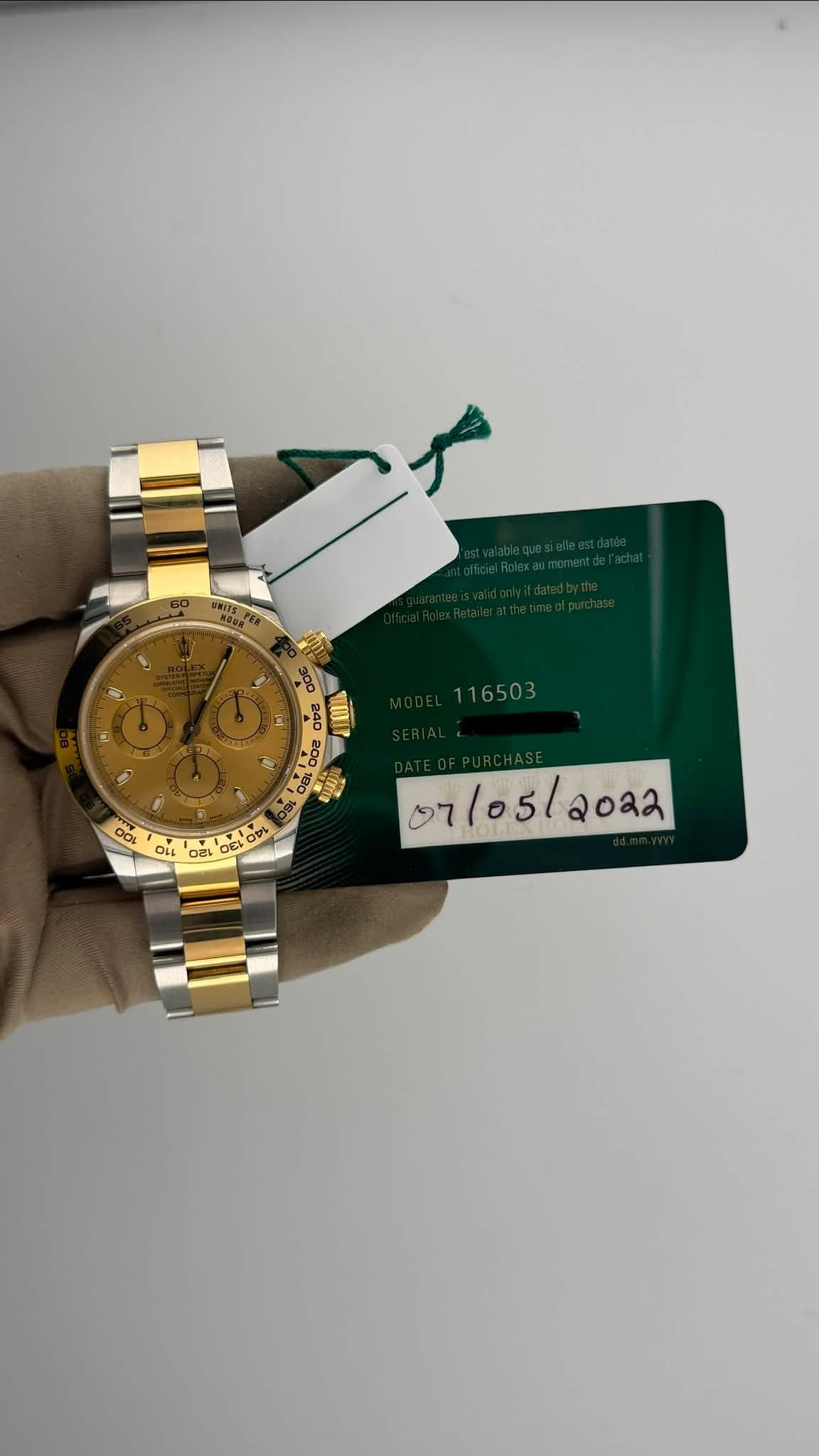 May be an image of wrist watch and text