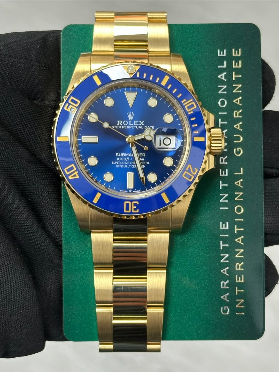 May be an image of wrist watch and text that says '50 ROLEX STER TERPERPETUAL DATE 10 ER SUBMAI 1000/ SUPERLATIVE OFFICIALLY YCES ਕহ METER 40 i 1 MACE 30 10 IATIONALE INTER…