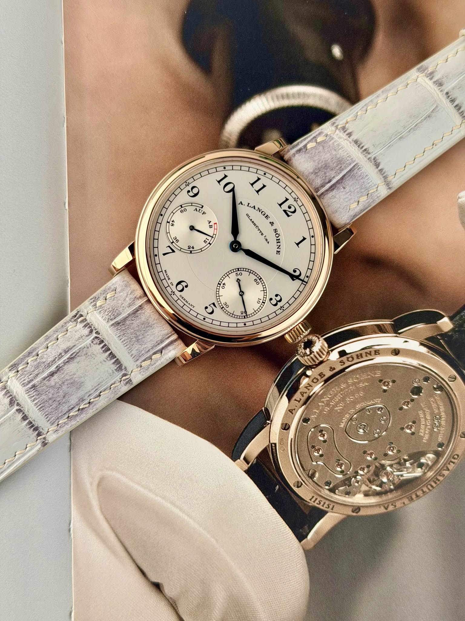 May be an image of wrist watch and text
