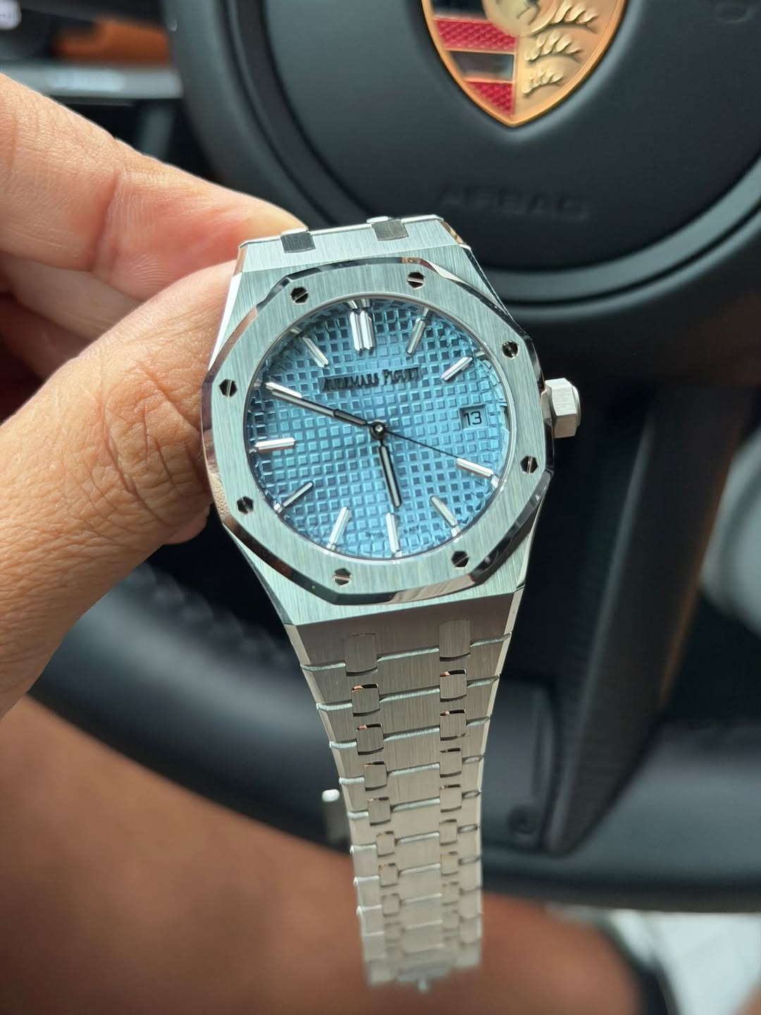 May be an image of wrist watch