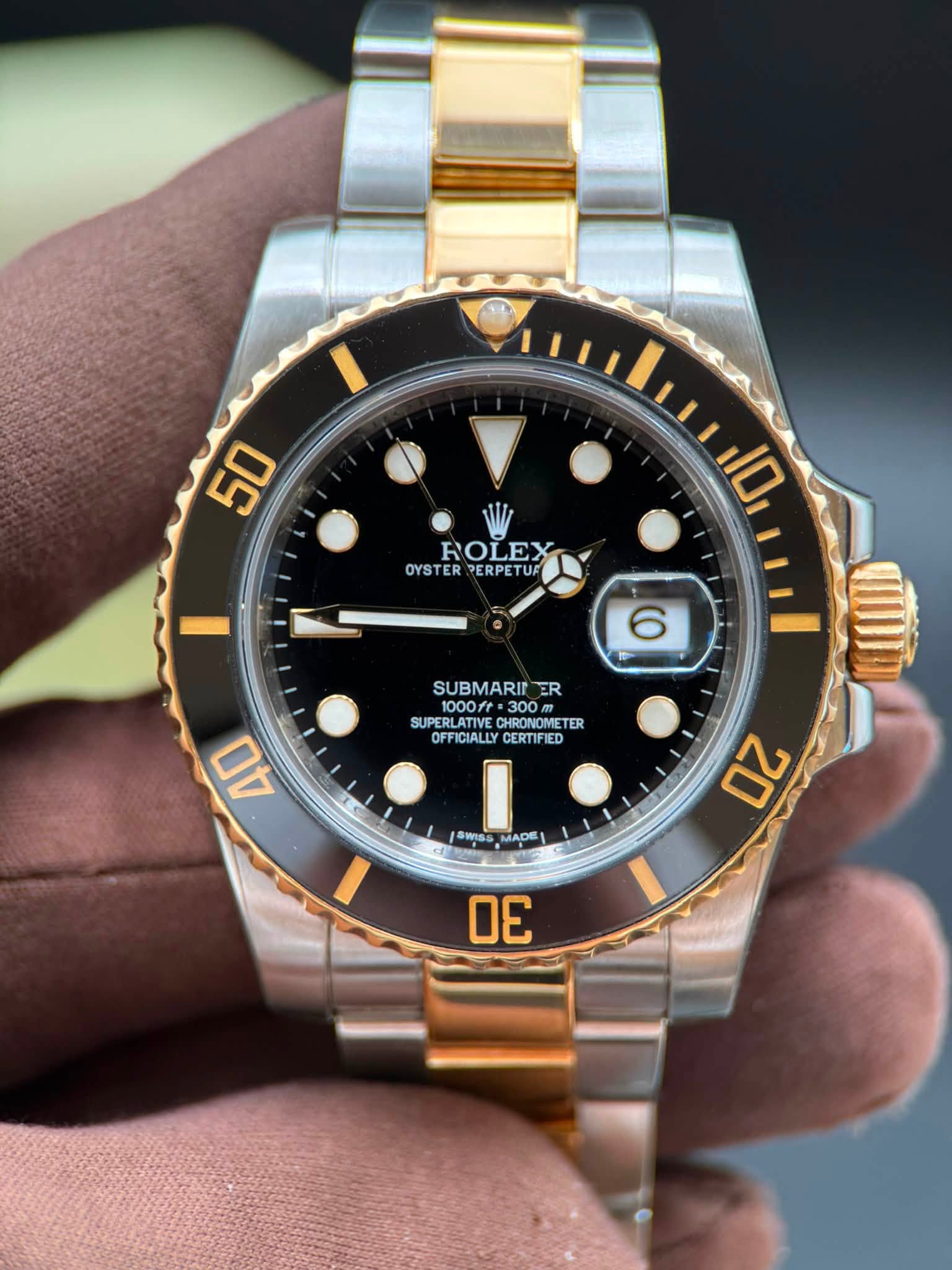 May be an image of wrist watch and text that says '50 ROLEX OYSTER OYSTERPERPETUF PERPETUF 10 6 SUBMARIT ER SUPOFFICIALLYERTIFIED SUPERLATIVECHRONONETER 1000升.300m SUBMARITER…