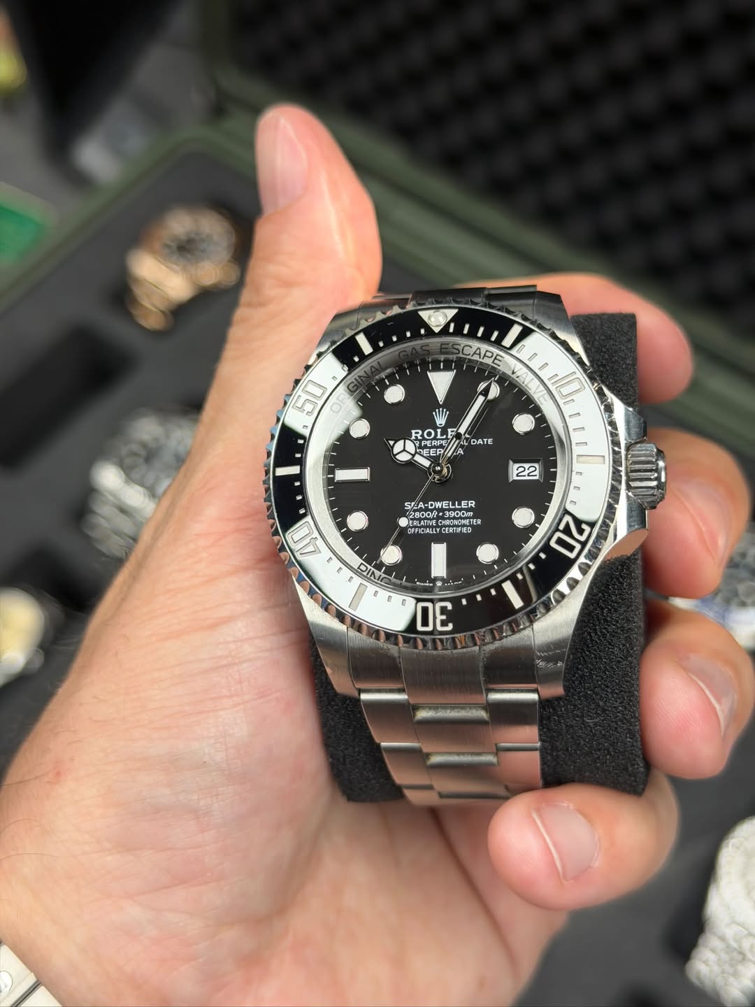 May be an image of wrist watch and text