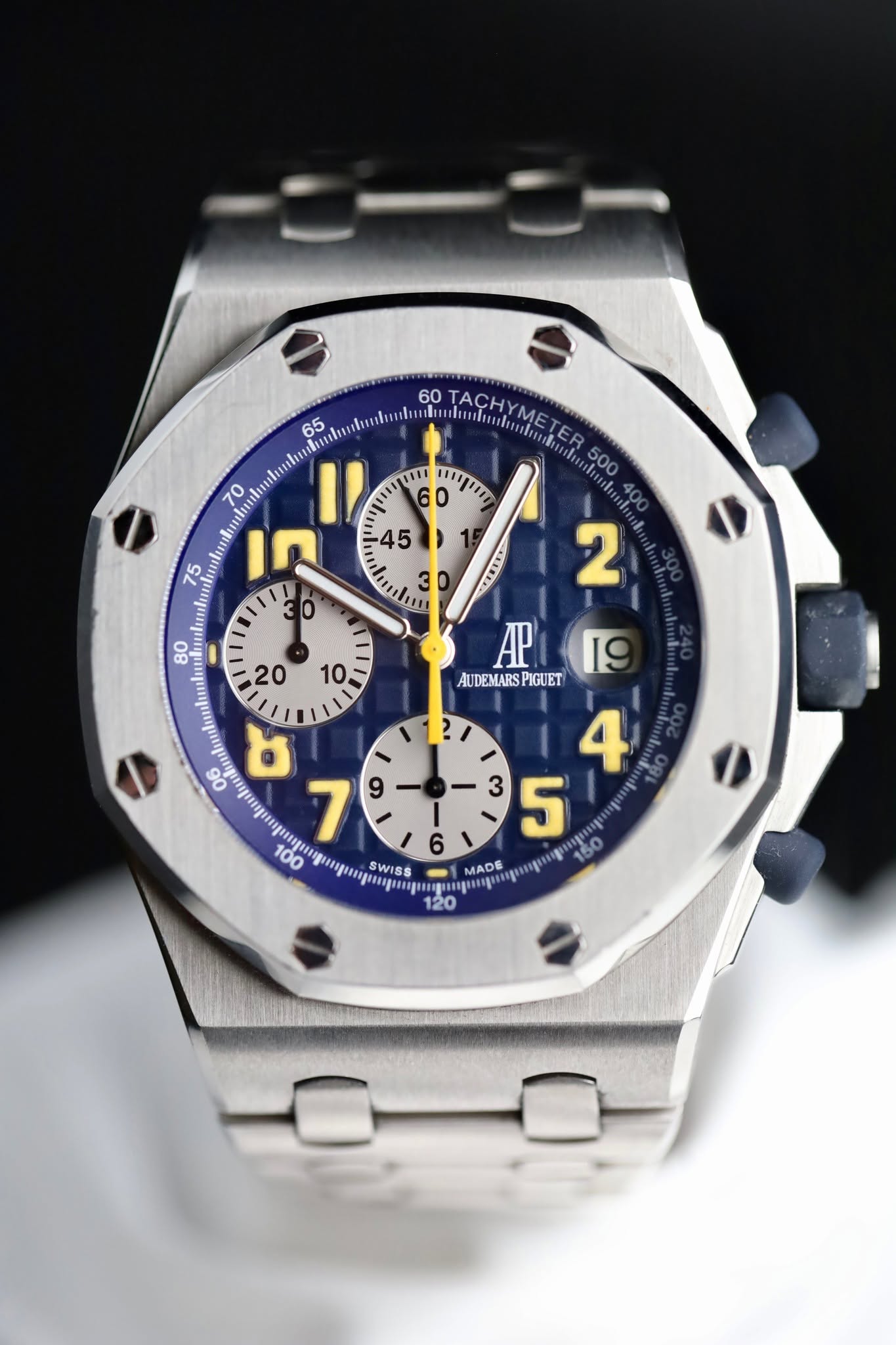 May be an image of wrist watch and text