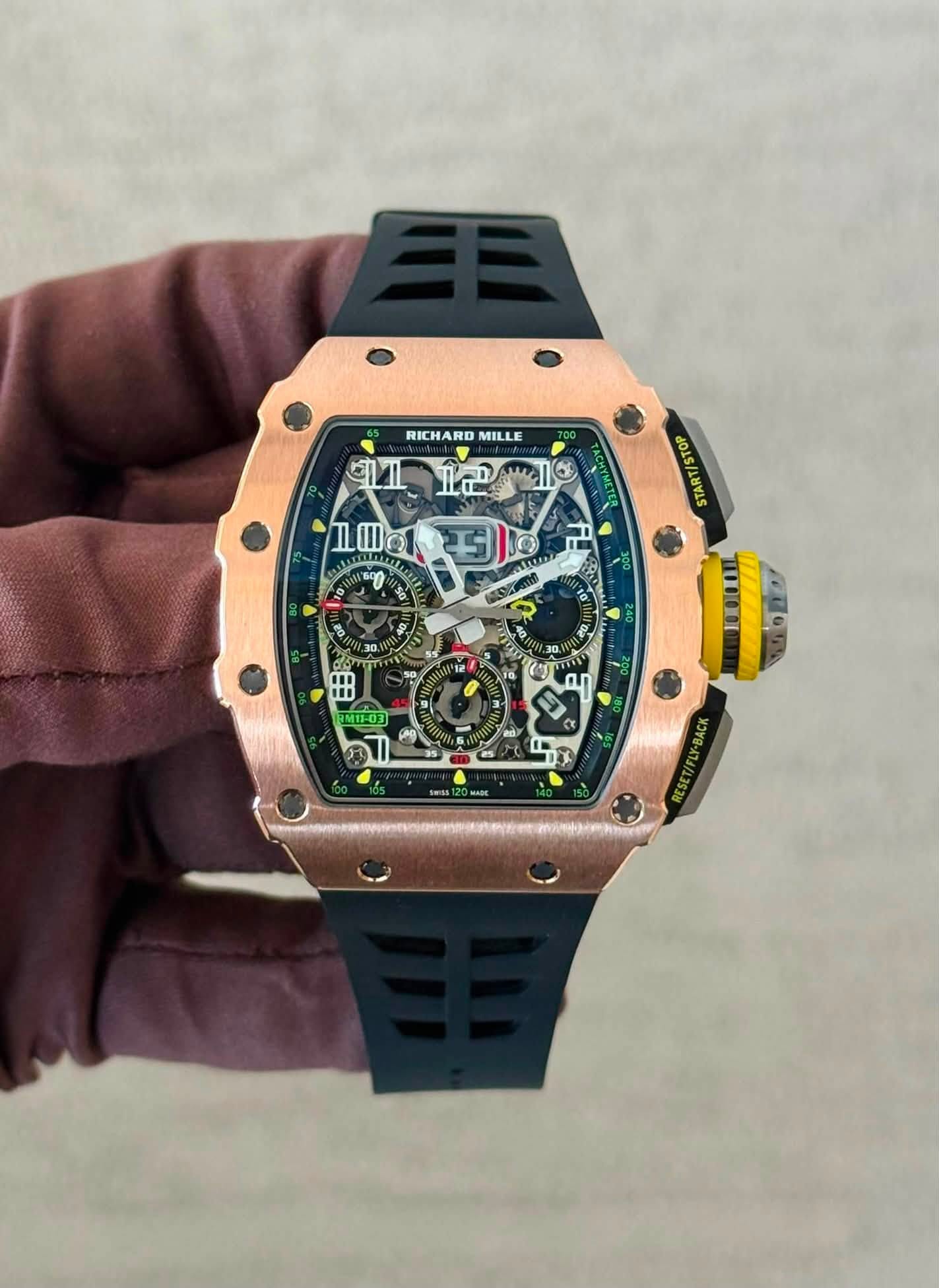 May be an image of wrist watch and text