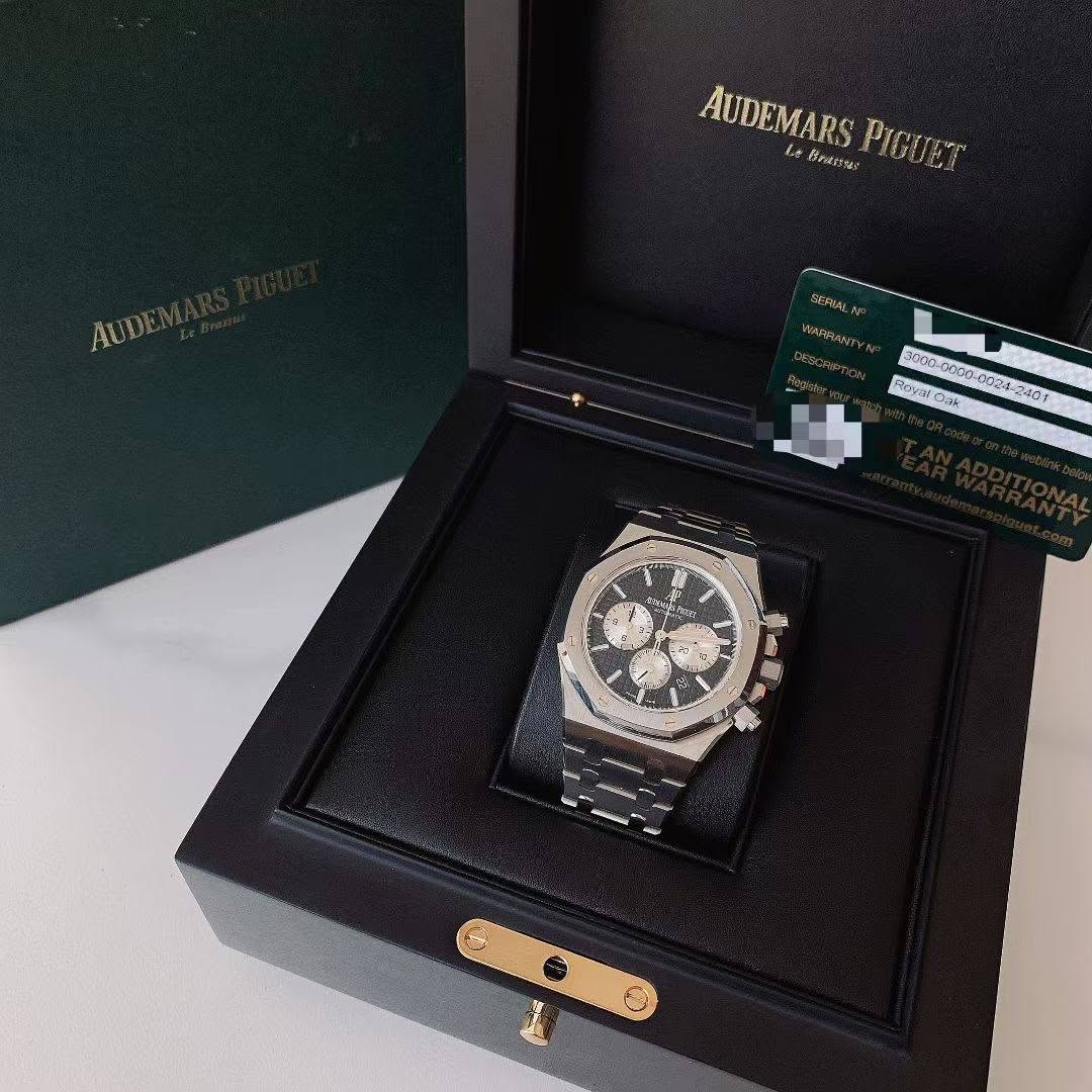 May be an image of wrist watch and text that says 'AUDEMARS AUDEMARSPIGUET L Bruassiar PIGUET DIGIen La SGFIAC WAPRAWY Rovalo Cisk LC አመክር 2'