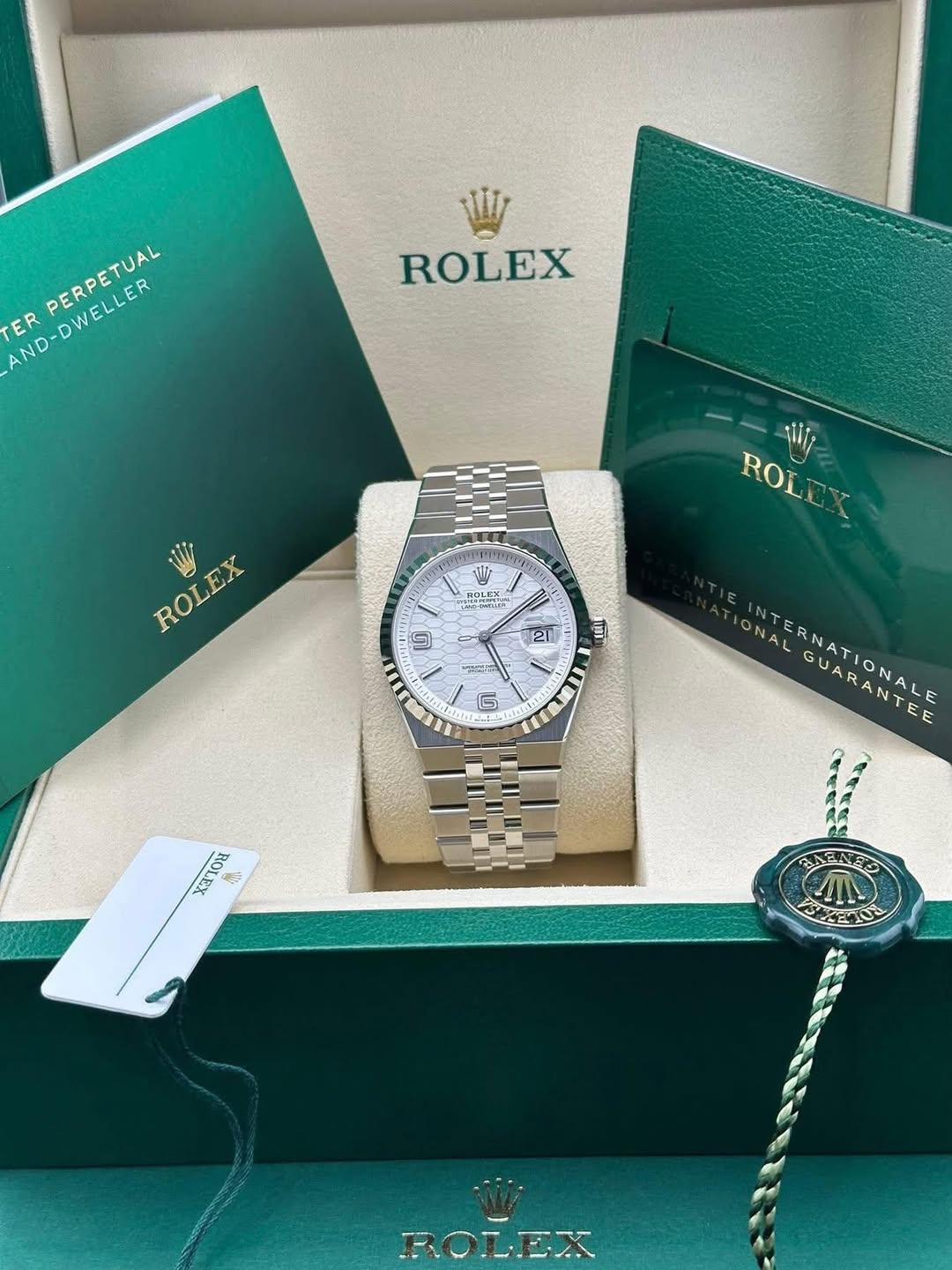 May be an image of wrist watch and text