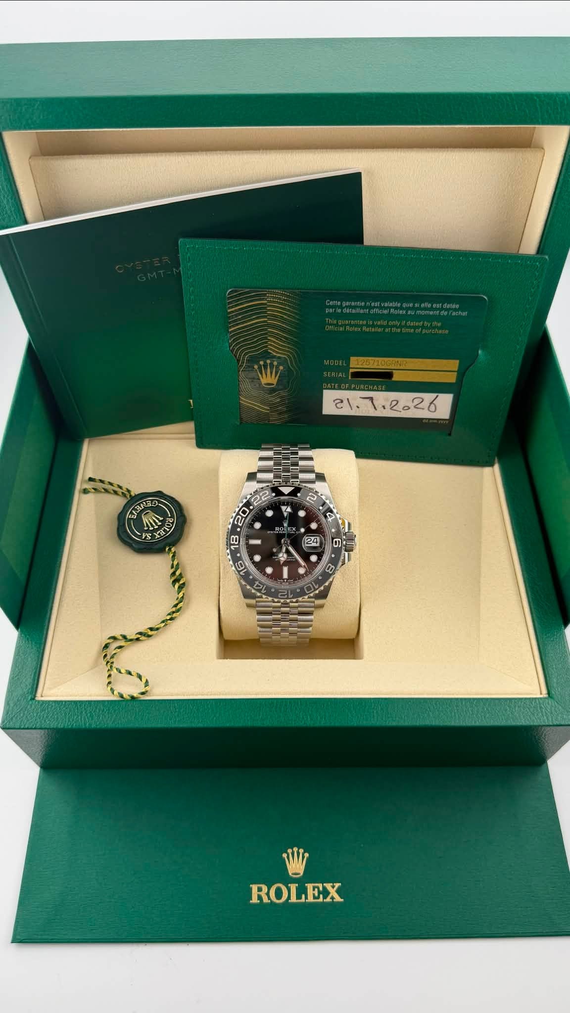 May be an image of wrist watch and text