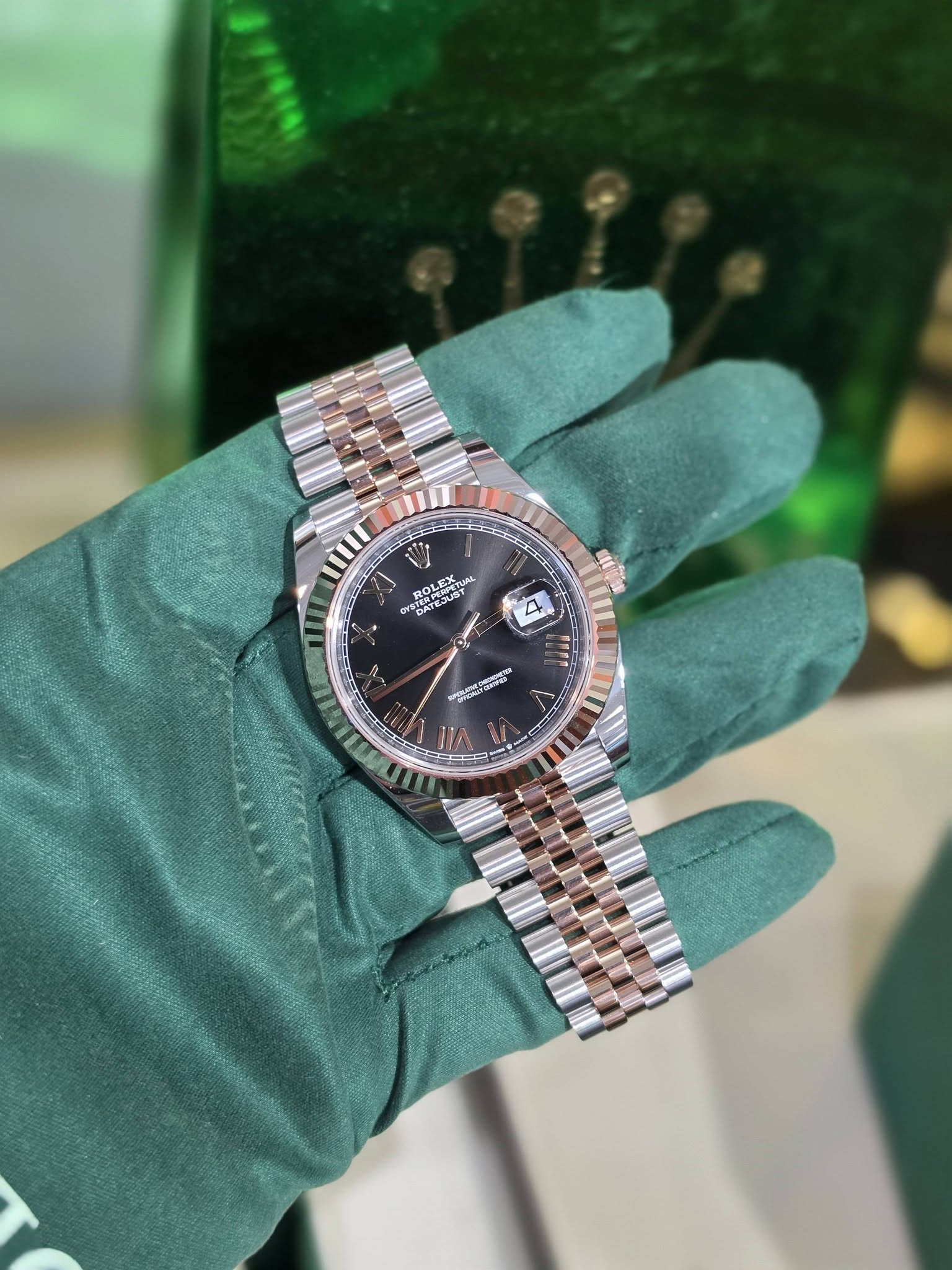 May be an image of wrist watch and text