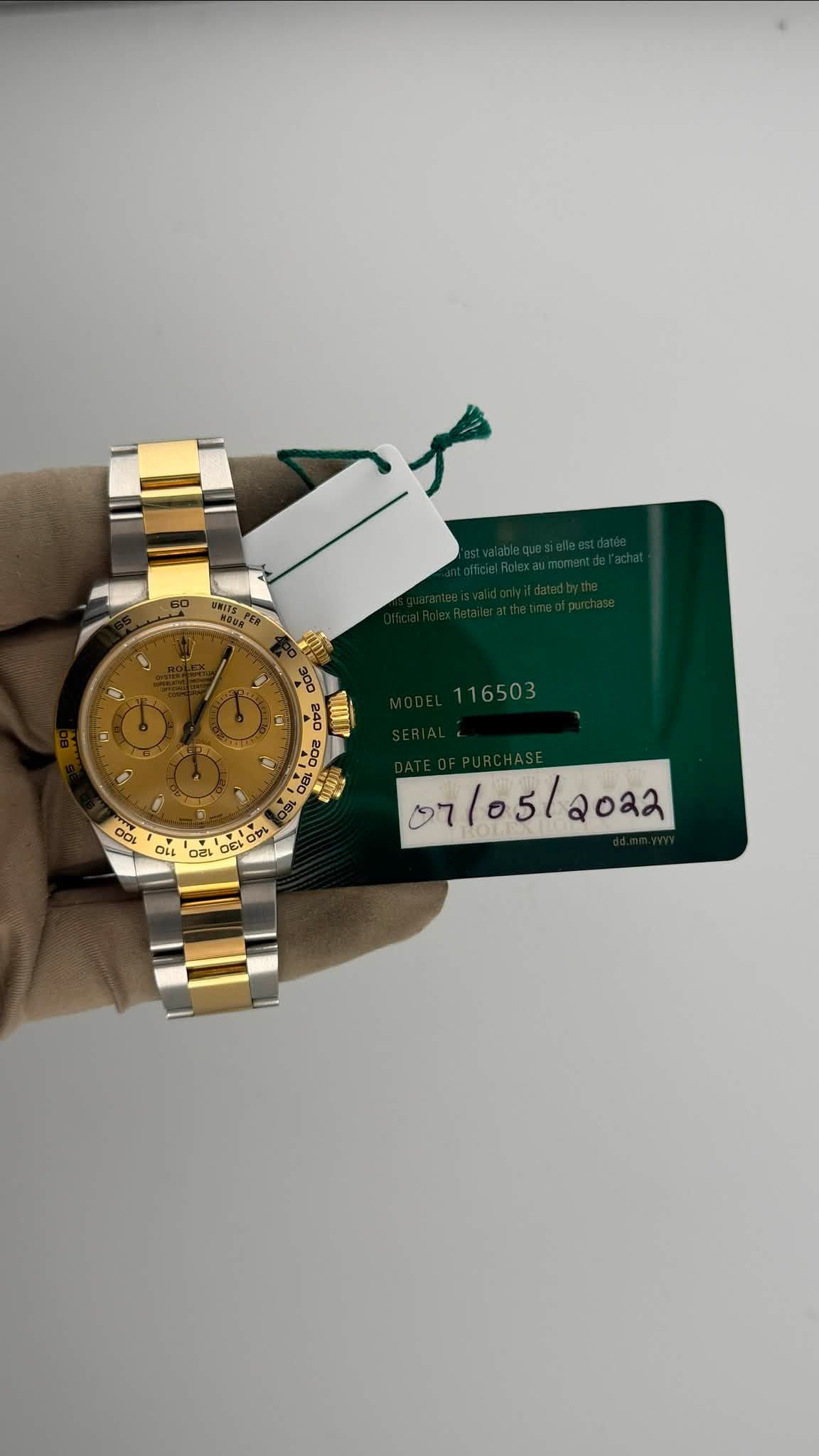 May be an image of wrist watch and text