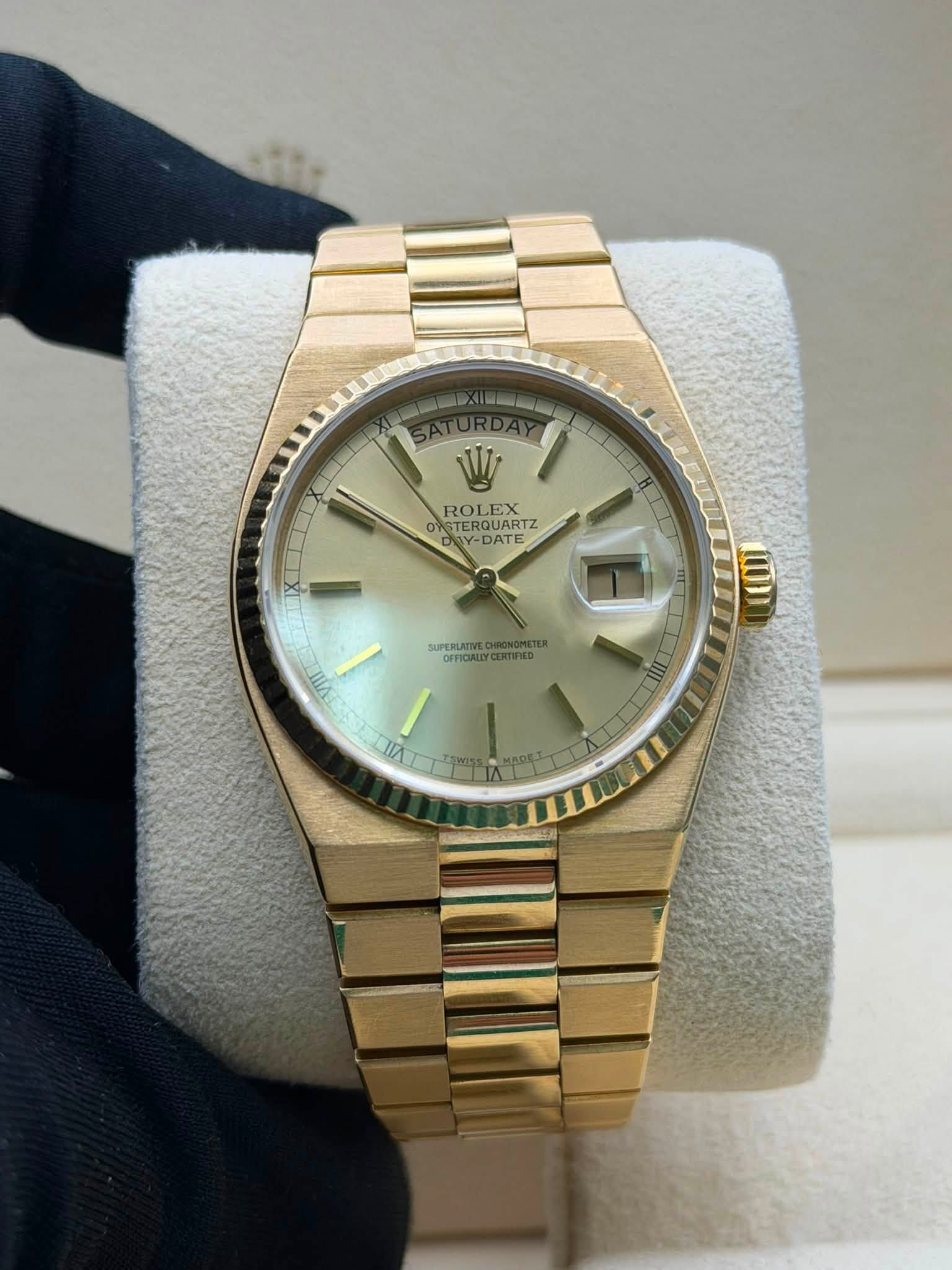 May be an image of wrist watch and text