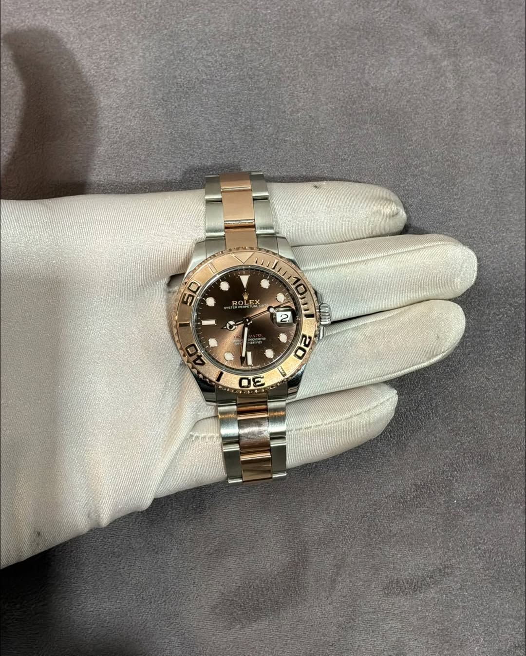 May be an image of wrist watch and text