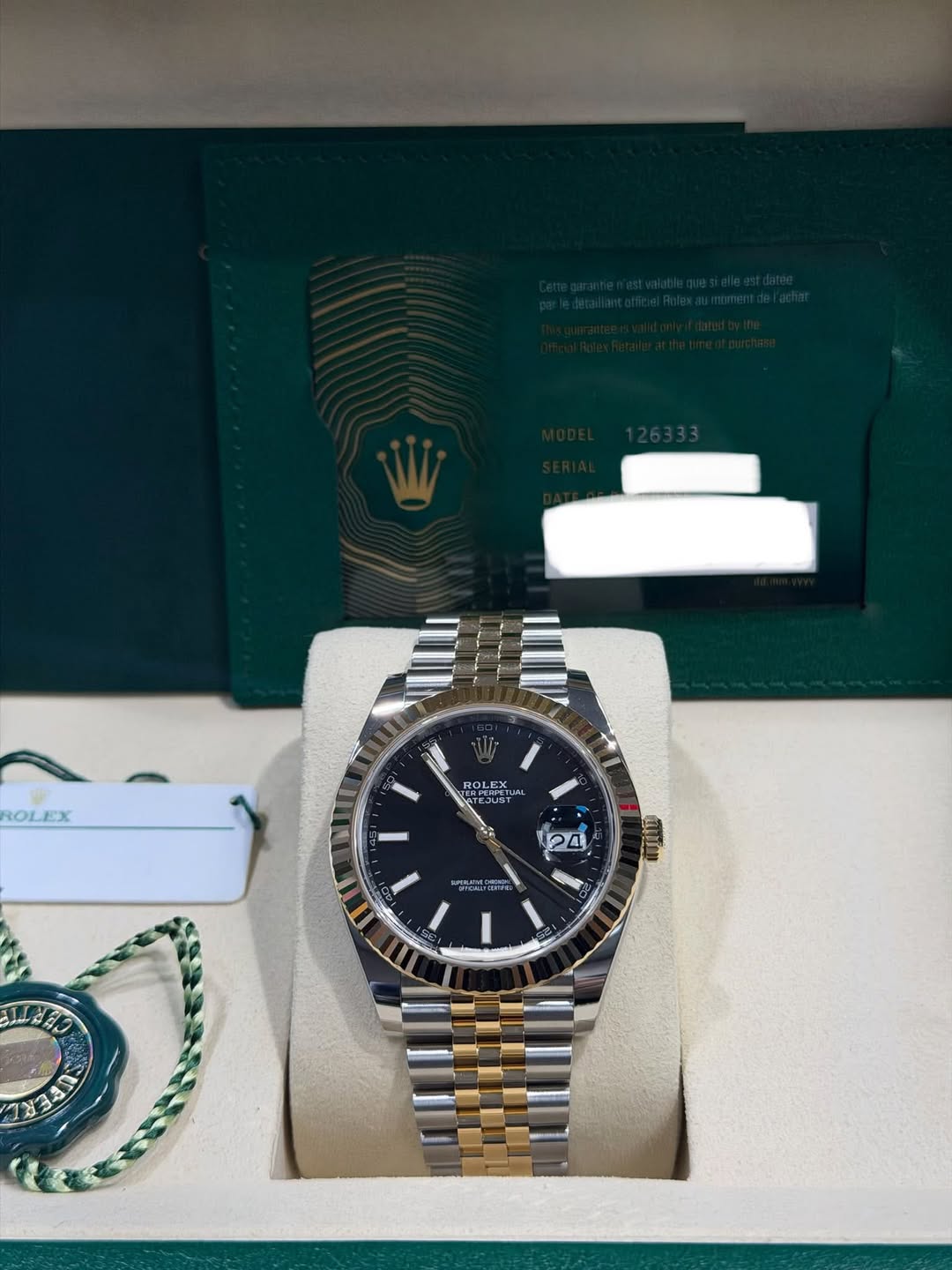 May be an image of wrist watch and text