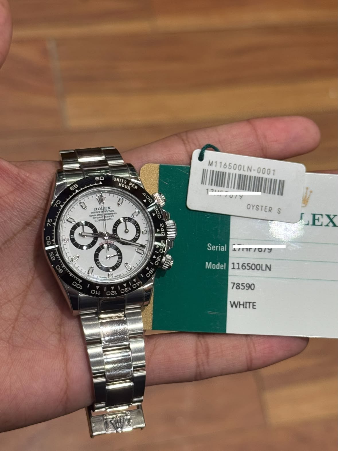 May be an image of wrist watch and text
