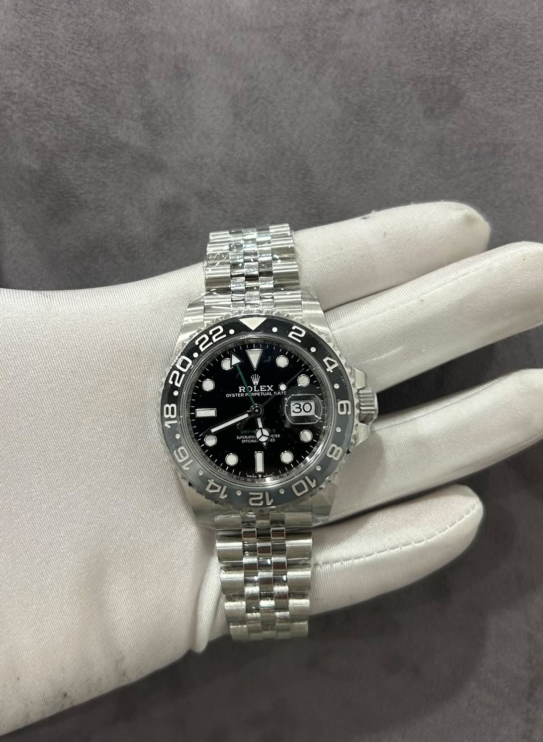 May be an image of wrist watch and text
