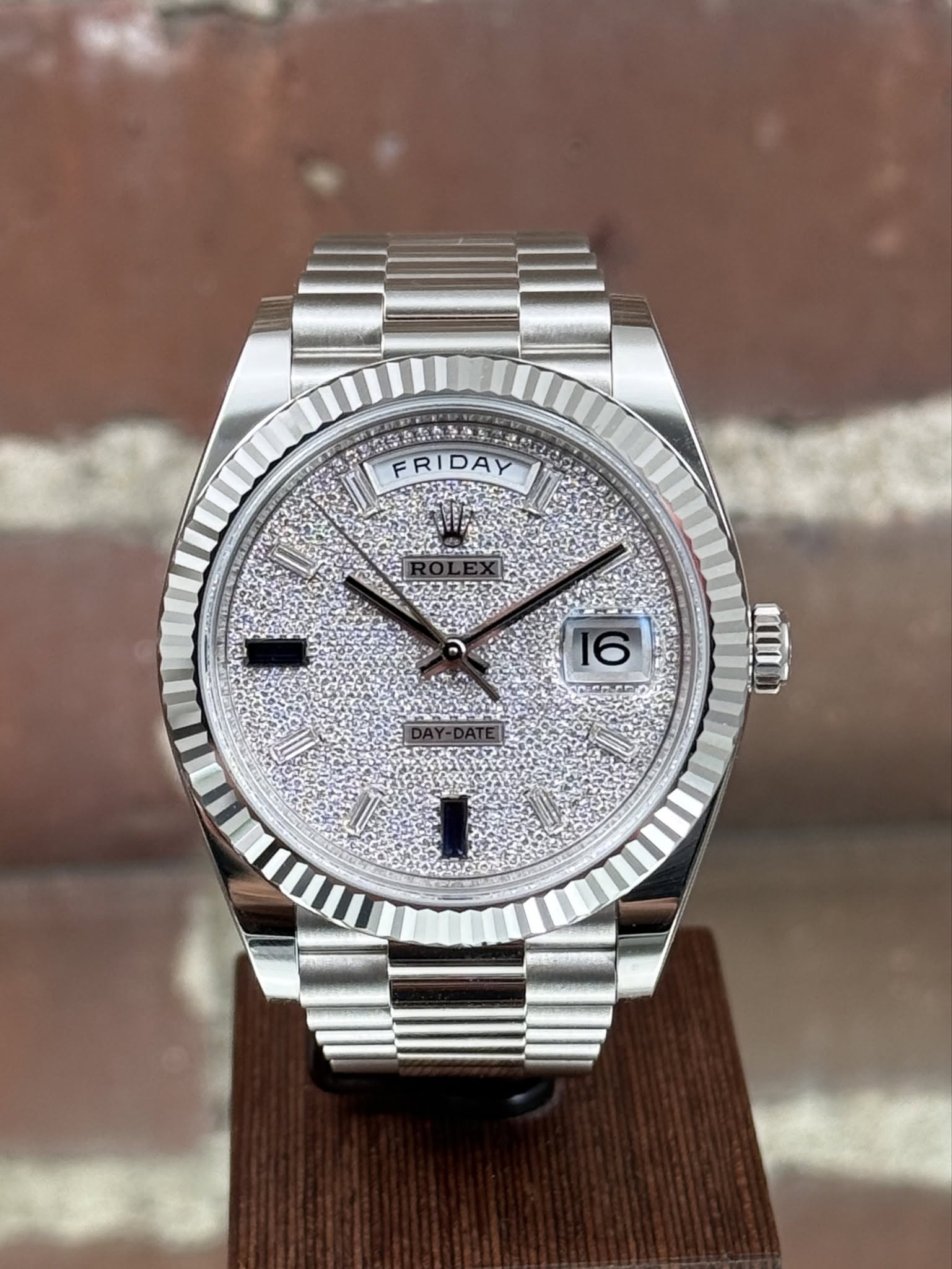 May be an image of wrist watch and text