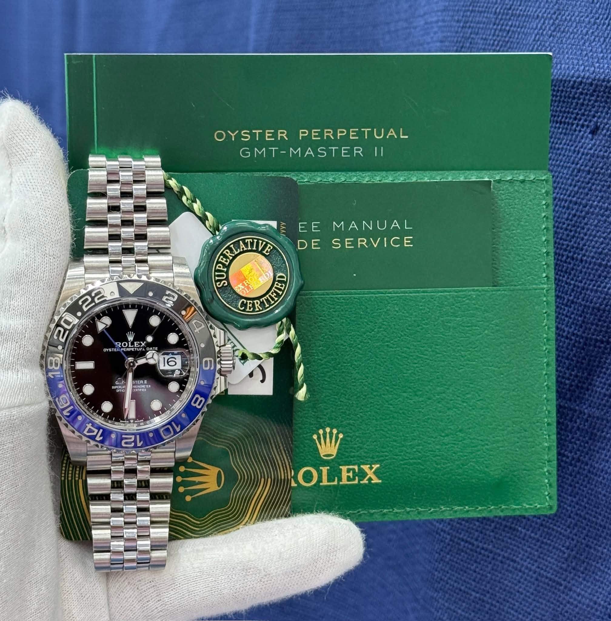 May be an image of wrist watch and text that says 'OYSTER PERPETUAL GMT-MASTER II EE MANUAL በማፍኒአጀበመል DE SERVICE CERTEE TIFTE CE في 4 20.22 ፍታ ROLE? - STERK RM LOLEX'