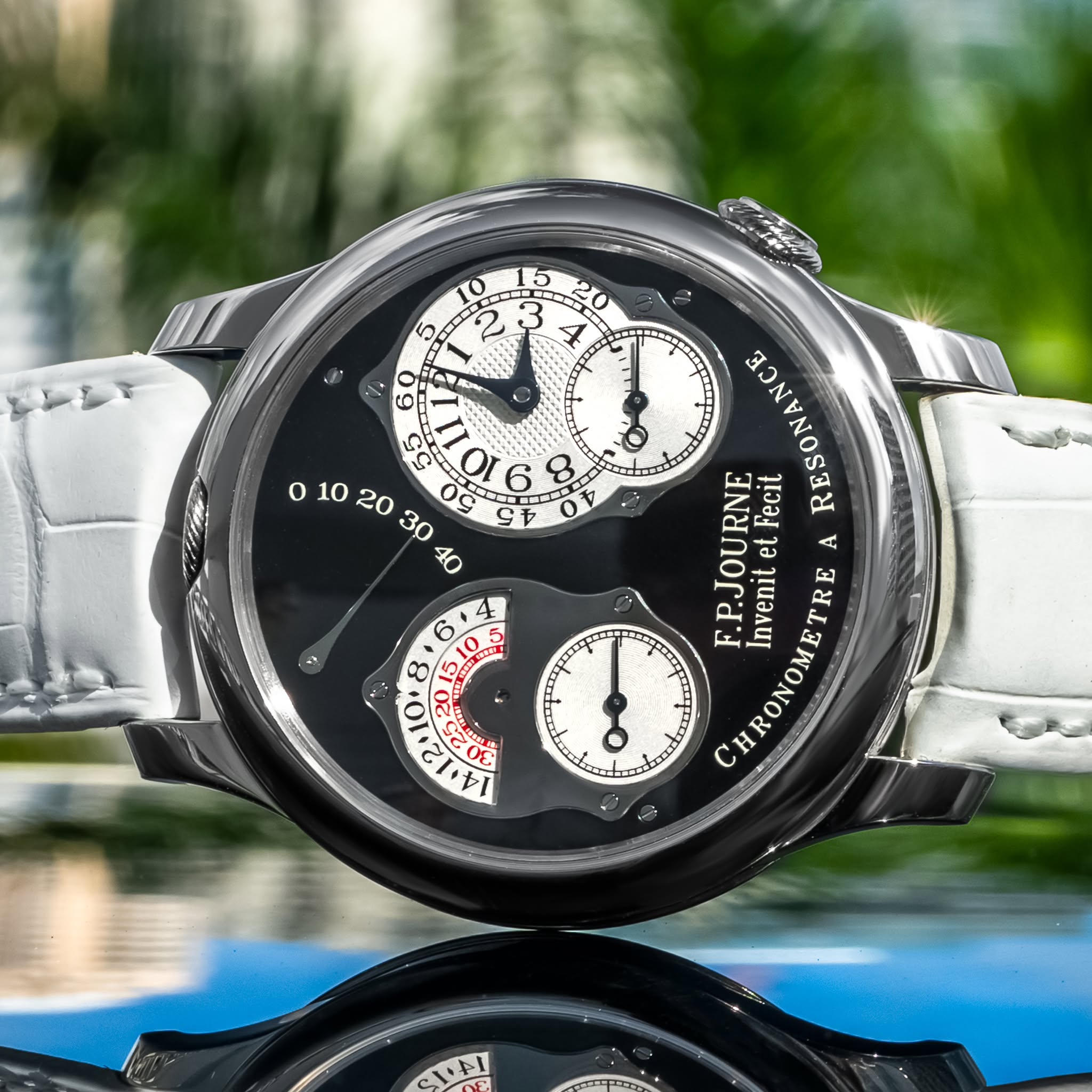 May be an image of wrist watch and text that says '10 5 حمد 3 マ o O C O 9 0O o 10 20 nC ፀሊ 30 C 40 6 8 RESONANCE Fecit .P.JOURNE et A C RONOMETRE Invenit tay い一サ'
