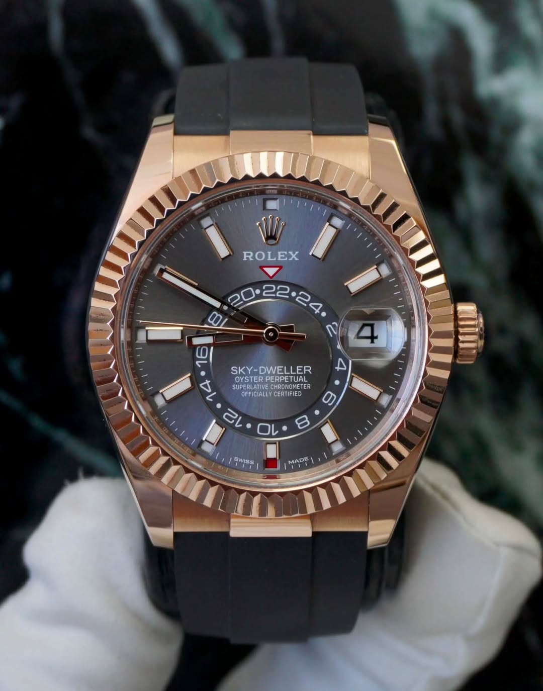 May be an image of wrist watch and text that says 'ROLEX 20.22 I በጋ 4 ط 16 SKY- SKY-DWELLER 14 OYSTERPERPETUAL PERPETUAL STED OYSTER SUPERLAT SUPERLATTC UFFICIALLYCERIFIED SUP…