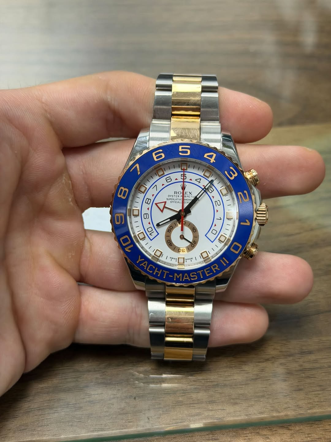 May be an image of wrist watch and text
