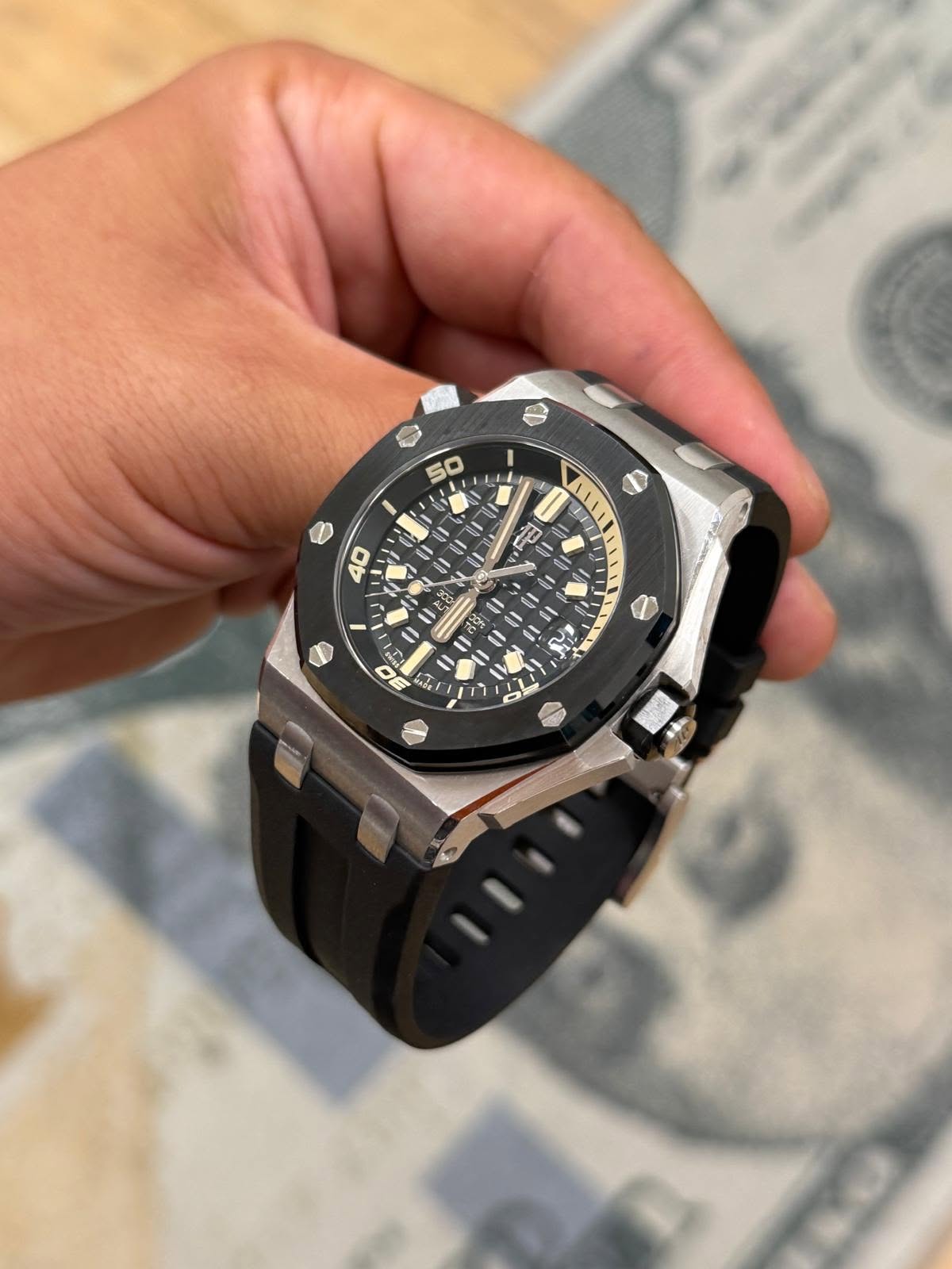 May be an image of wrist watch and text