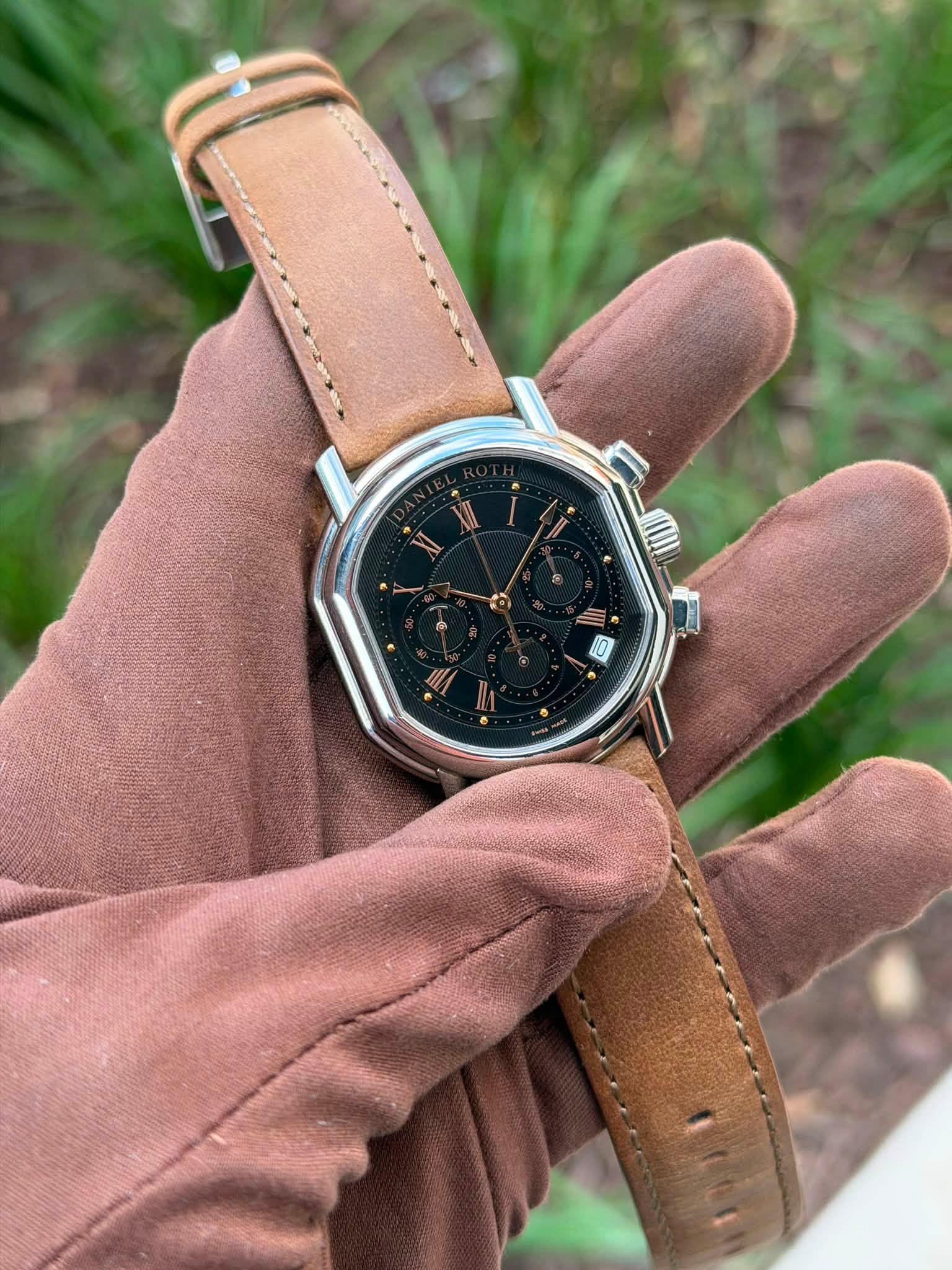 May be an image of leather and wrist watch