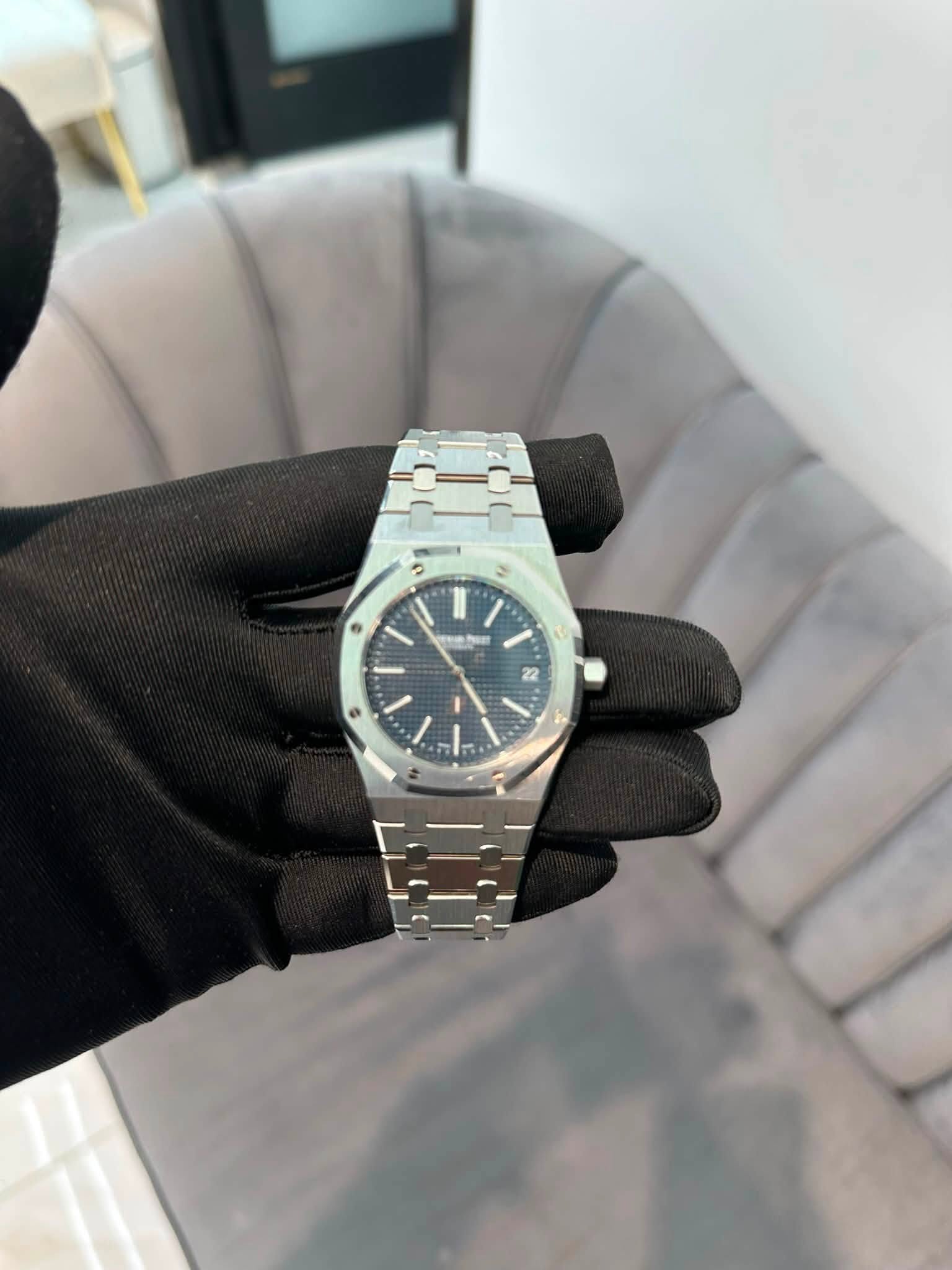 May be an image of wrist watch and text