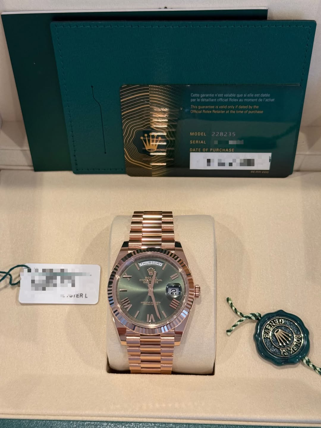 May be an image of wrist watch and text