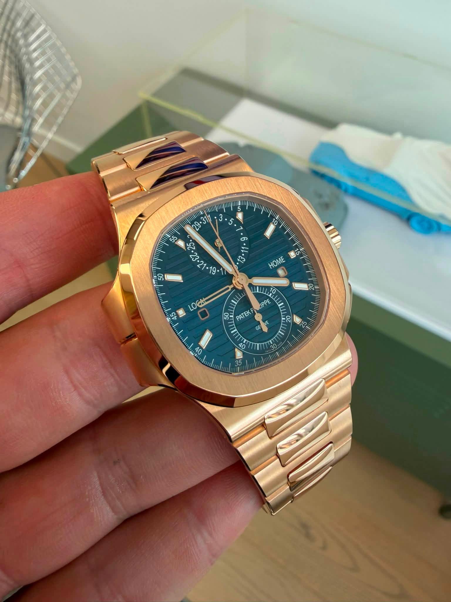 May be an image of wrist watch and text that says ' . C23- G 心 HOME - LOC ILL UPPE お PATEK de 5 O 4 40 MT 11'