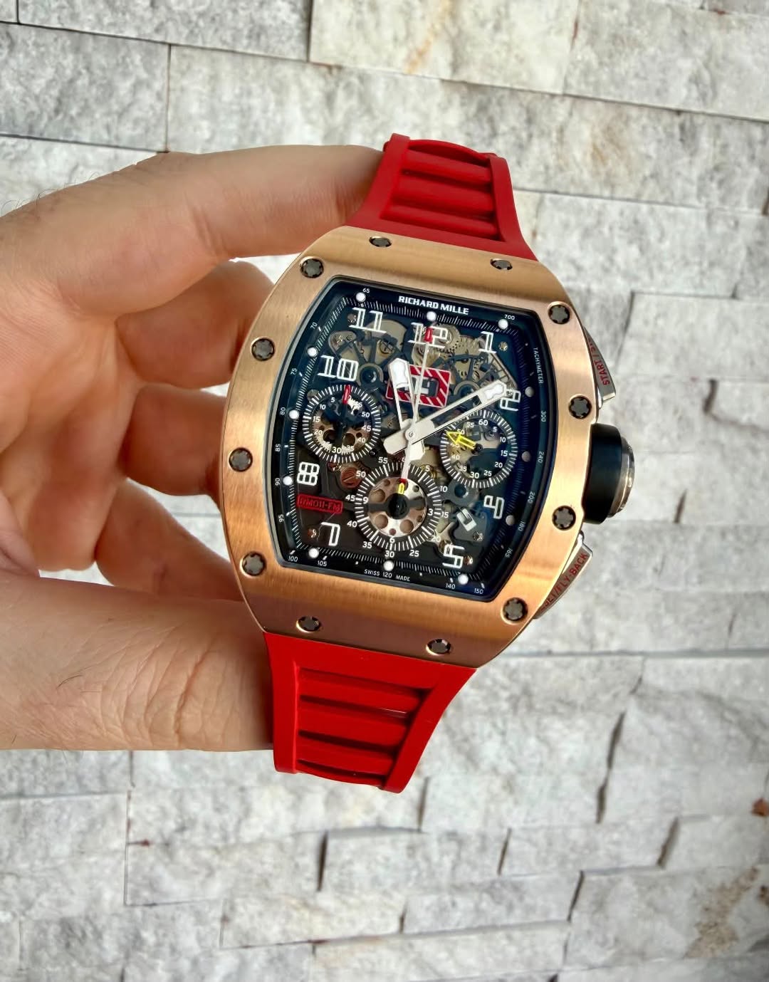 May be an image of wrist watch and text that says 'RICHARD MILLE II 비약김 T L0I لد 8R म 0 D ل ချ S'