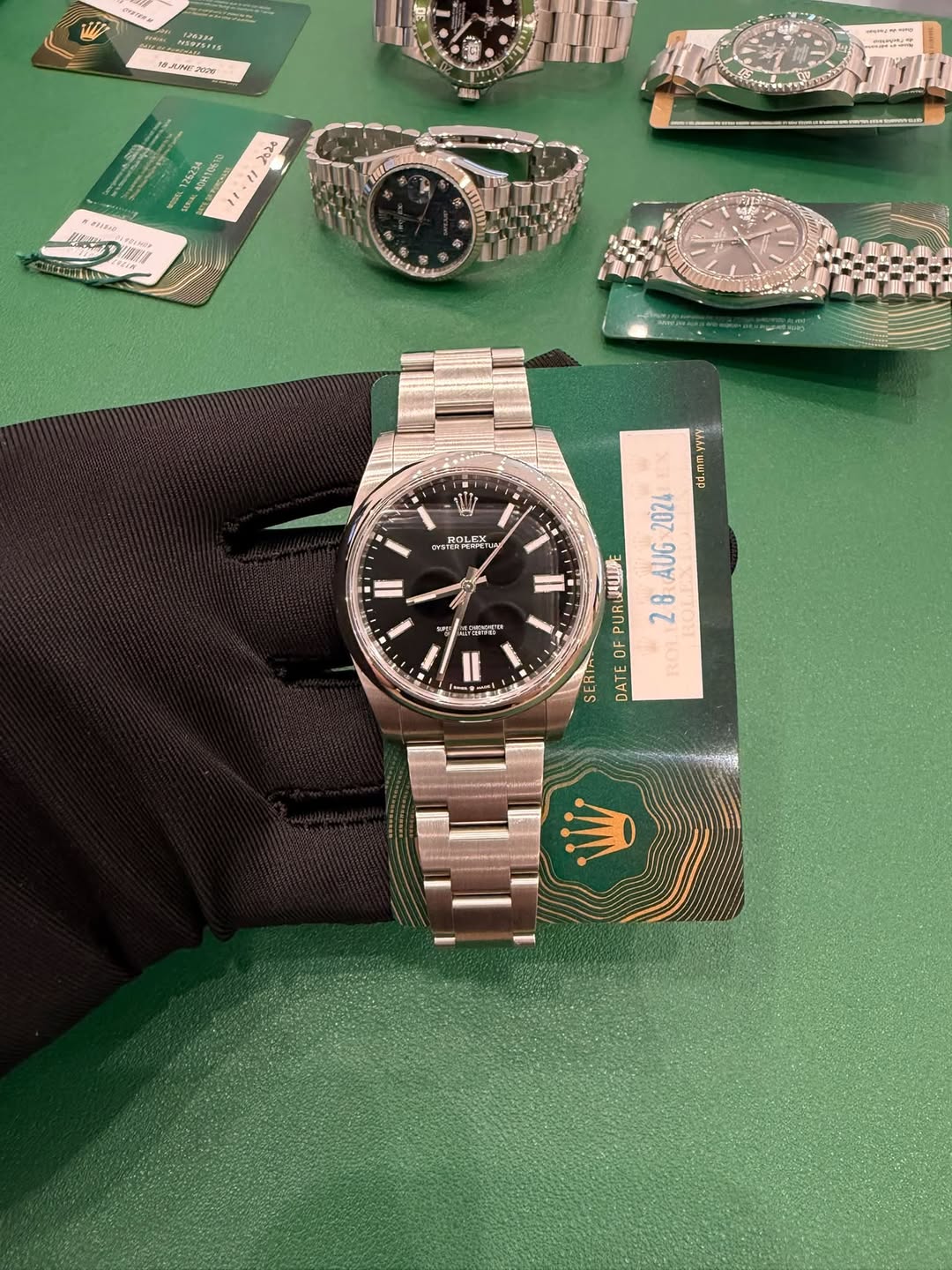May be an image of wrist watch and text