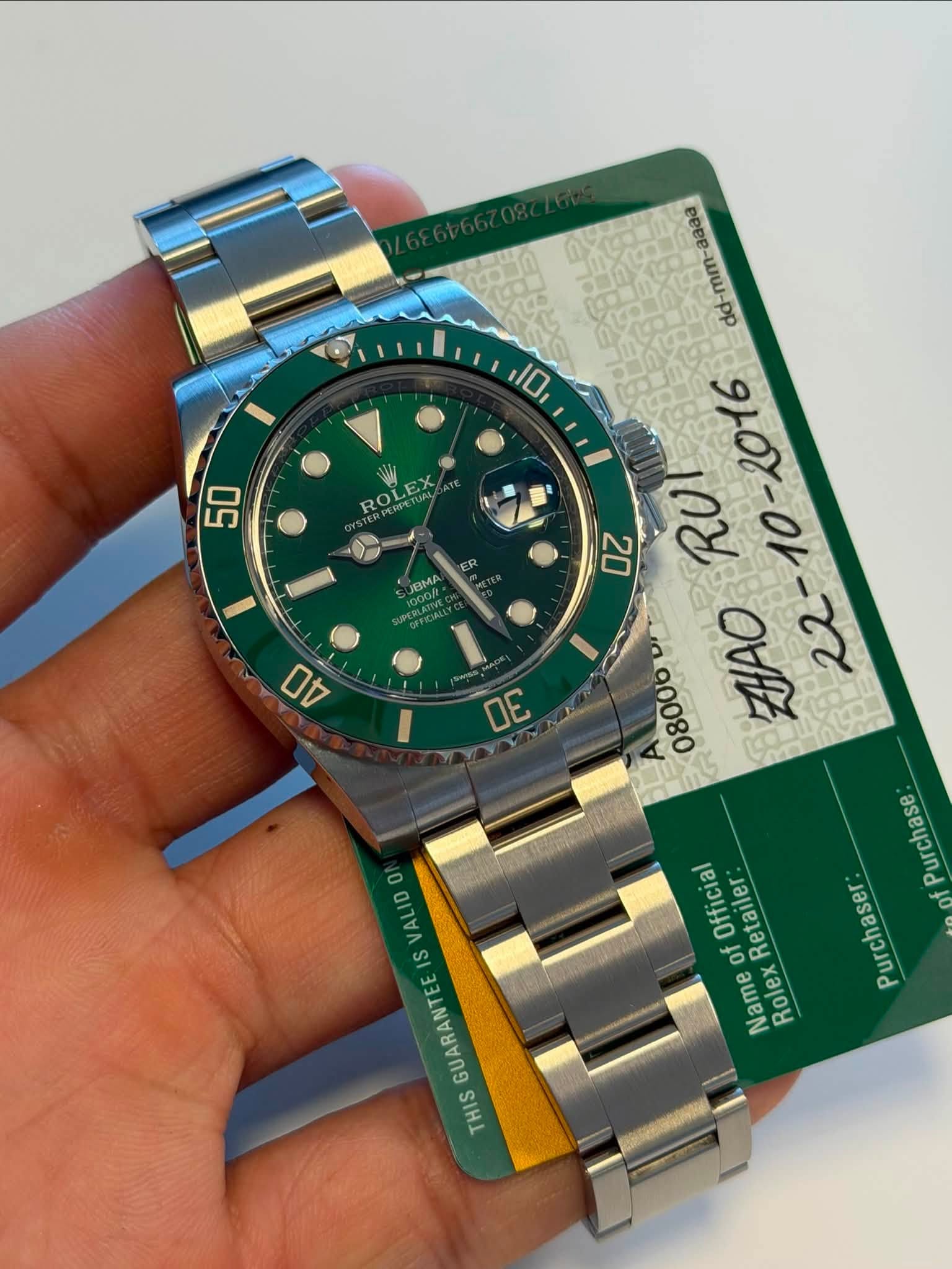 May be an image of wrist watch and text that says '10 50 ROLEX ER DBM BMP 4O I 2016 20 RU I 08000 30 ZHAO 22 Purchase Purchaser 0 VALID S GUARANTE THIS Official of Ketailer Name…