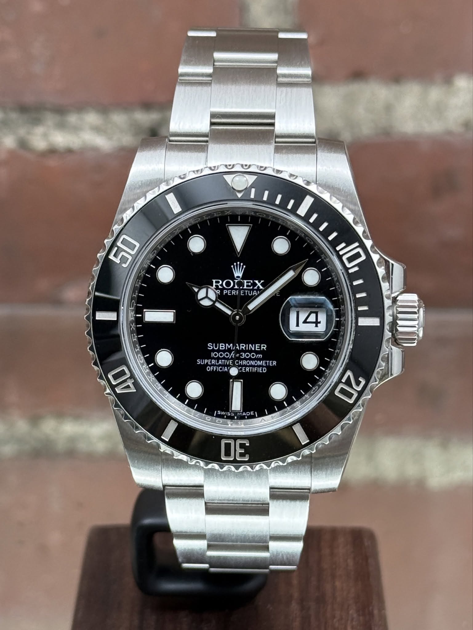 May be an image of wrist watch and text that says '50 RODEX CEX PERFETUA P PERF TυA! i 10 14 40 i SUBM SUBMARINER ARINER 1000f 000/=300. =300m SUPERL UPERLATIVE…