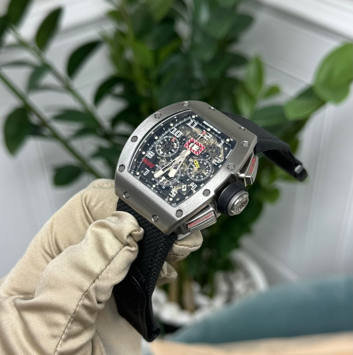 May be an image of wrist watch and text