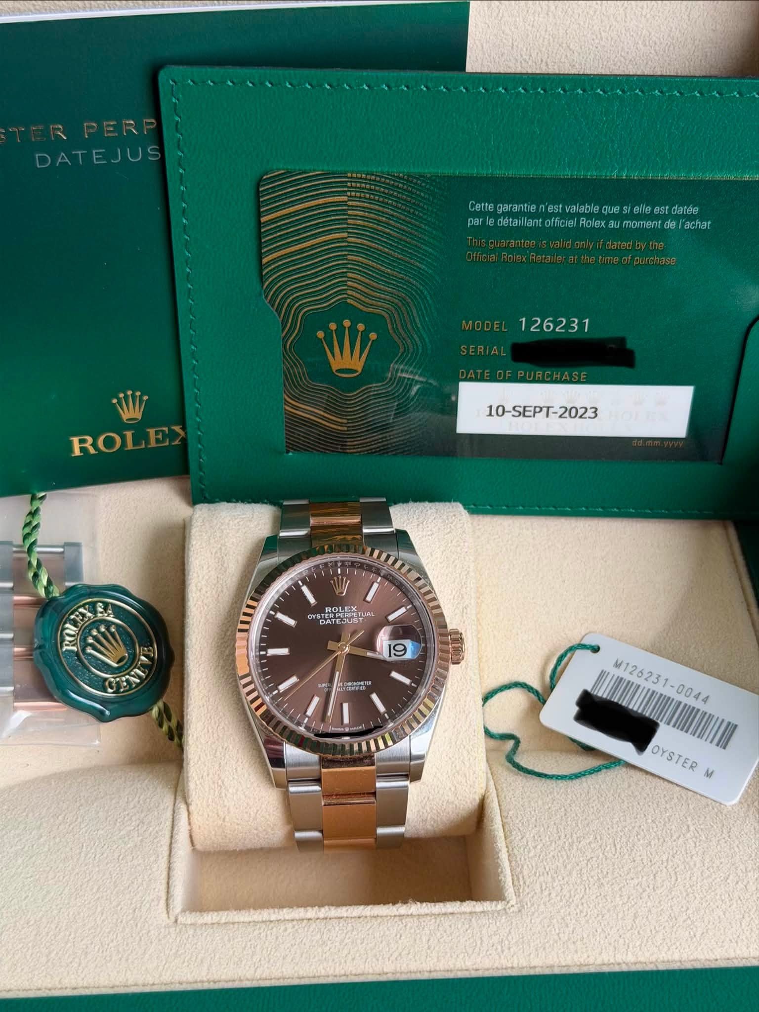 May be an image of wrist watch and text