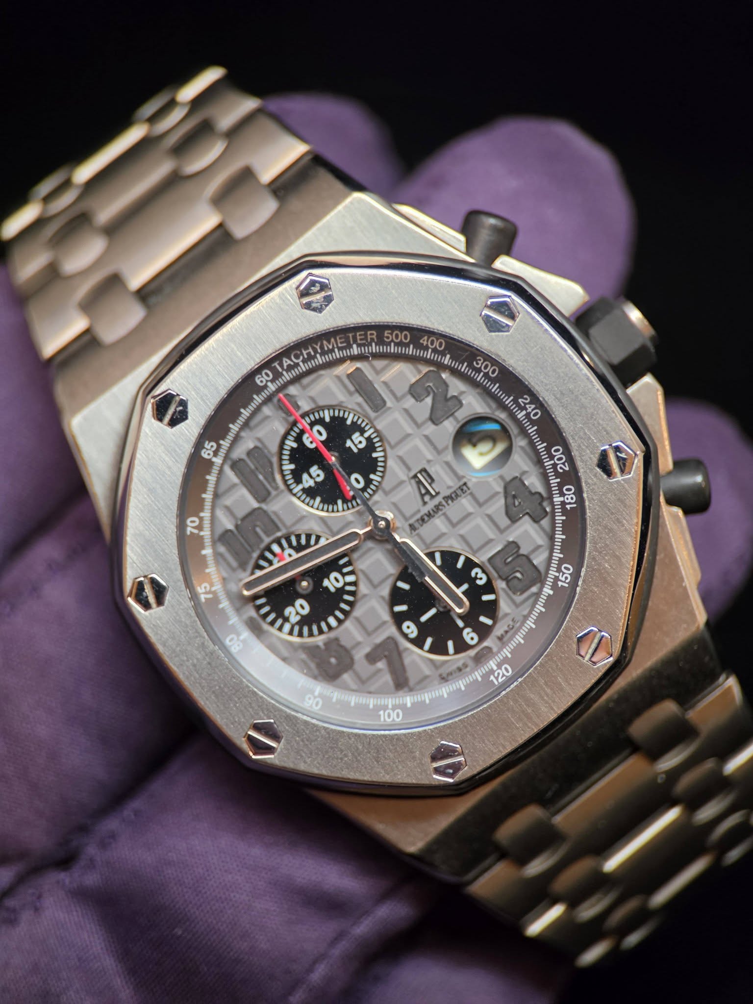 May be an image of wrist watch and text