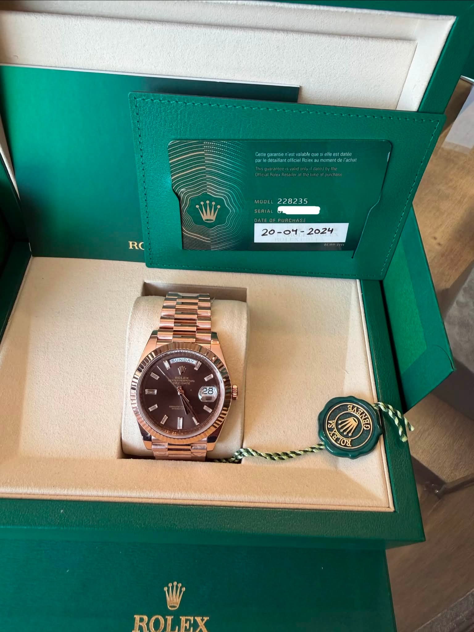 May be an image of wrist watch and text