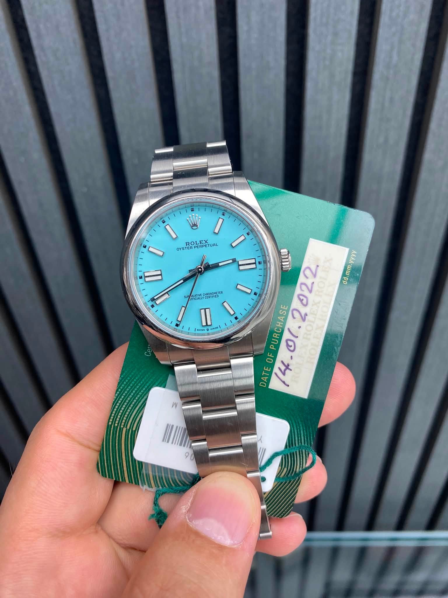 May be an image of wrist watch and text that says 'I ROLEX TEOи TUAL STERFERPE - ZHCAL AiaeD Pe" II I I II ወን VYYY / 022. mm.y dd. ATEOFPURCHASE PURCHASE 2 DATE OF ۵۵'